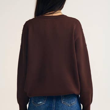 Pull avec franges sur le devant