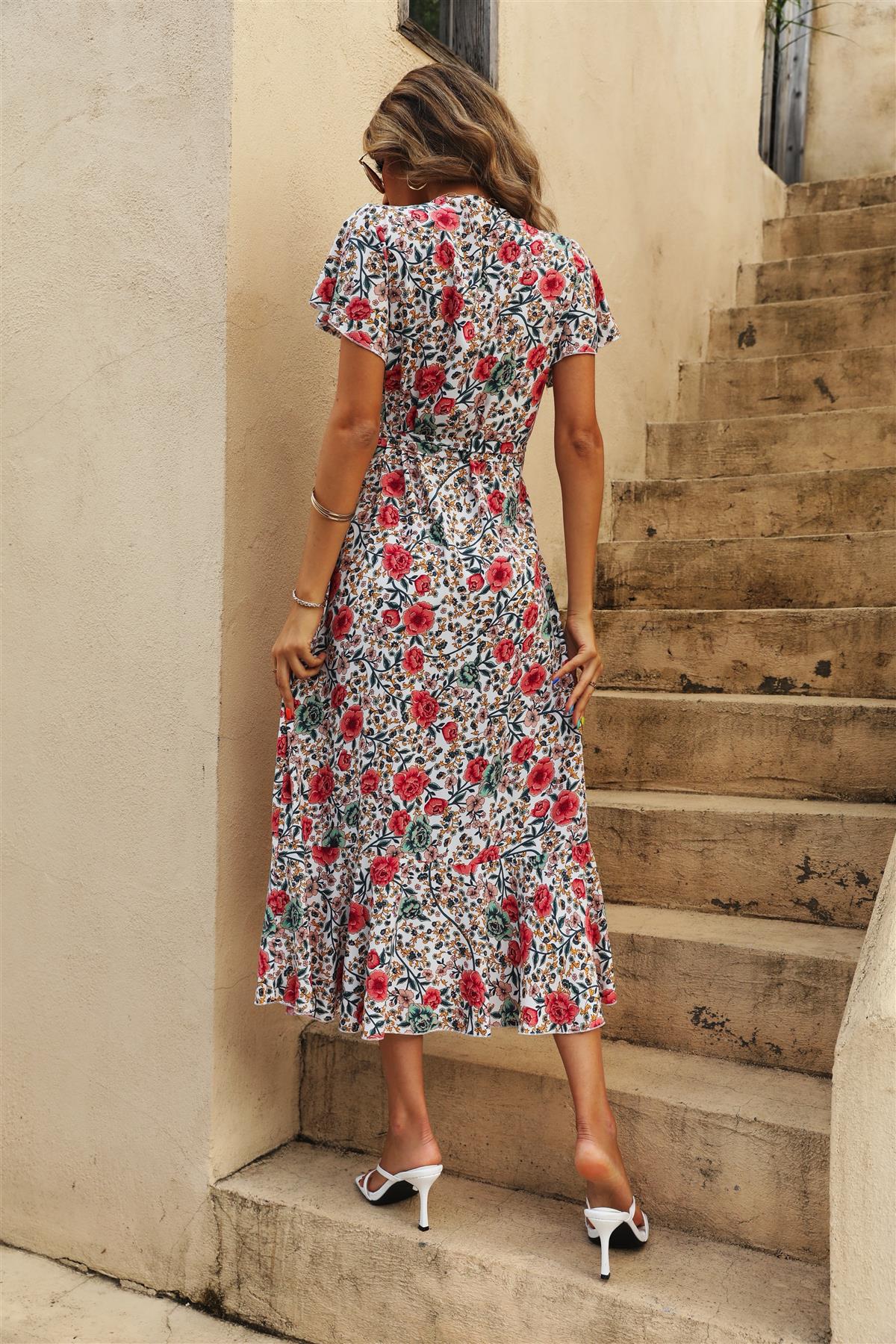 Robe mi-longue à imprimé floral en blanc