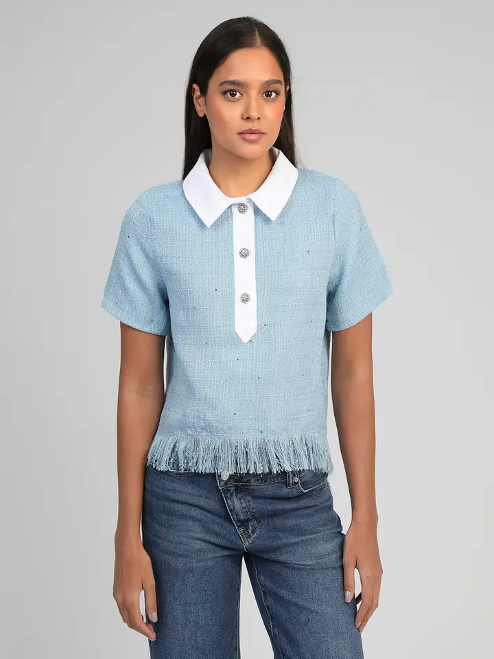 Le polo ciel en tweed