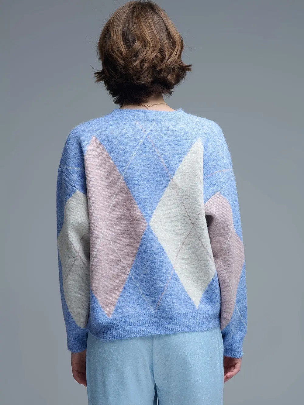 Pull tricolore et losange 