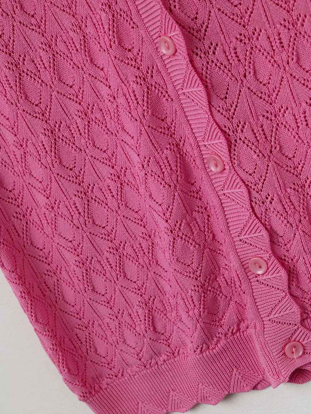 Le gilet en maille pointelle