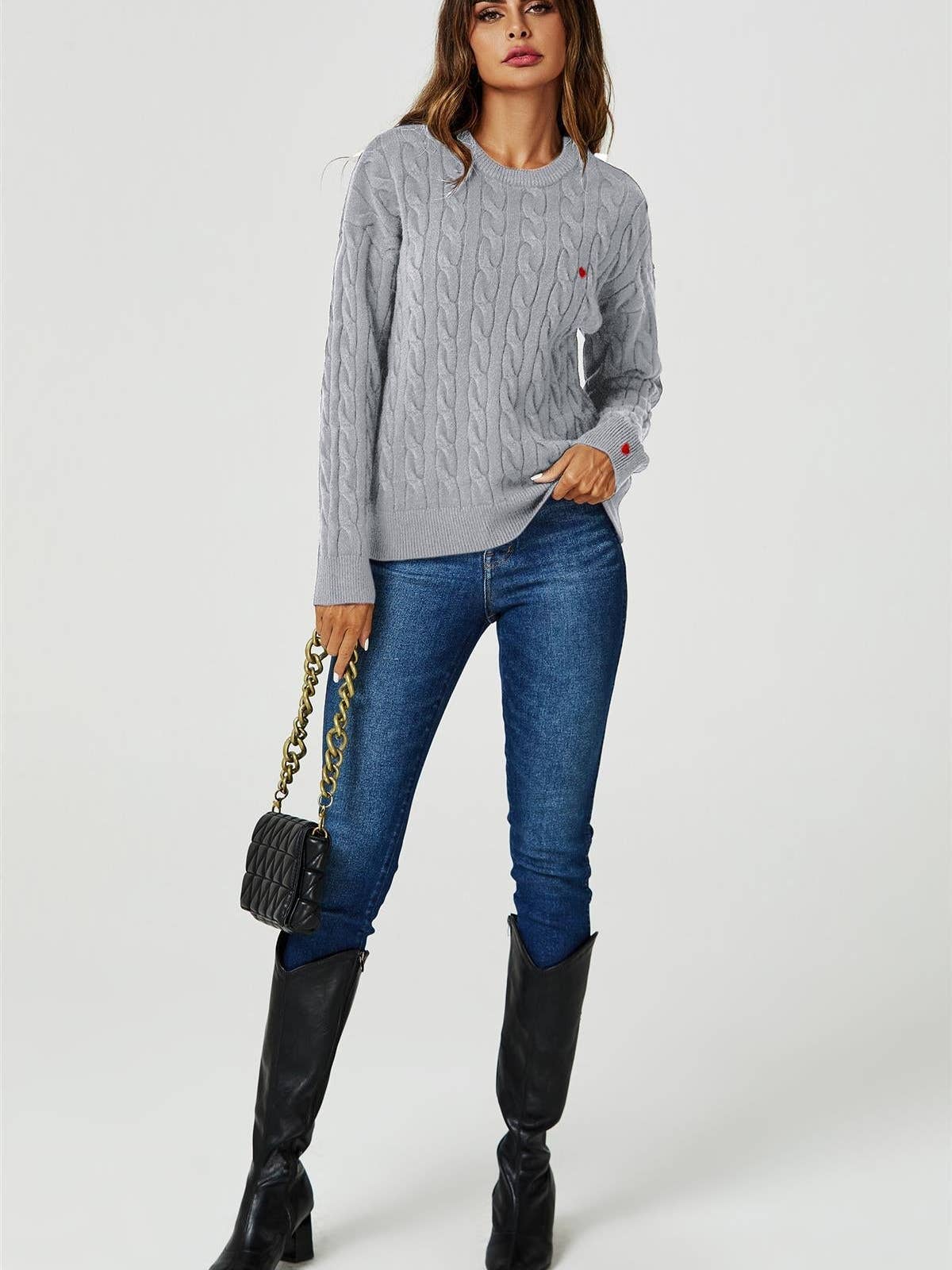 Le pull en maille coton avec broderie cœur