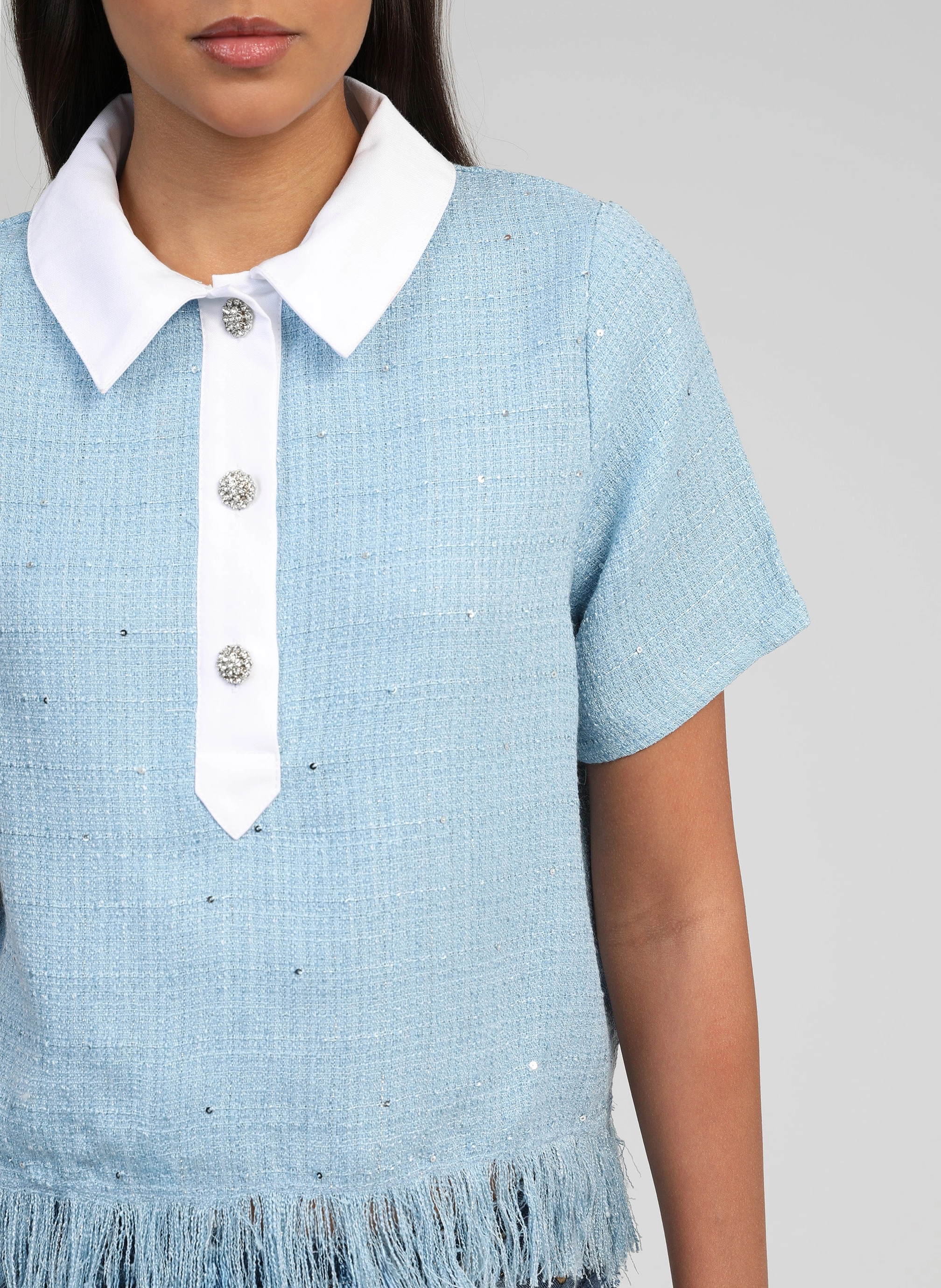 Le polo ciel en tweed