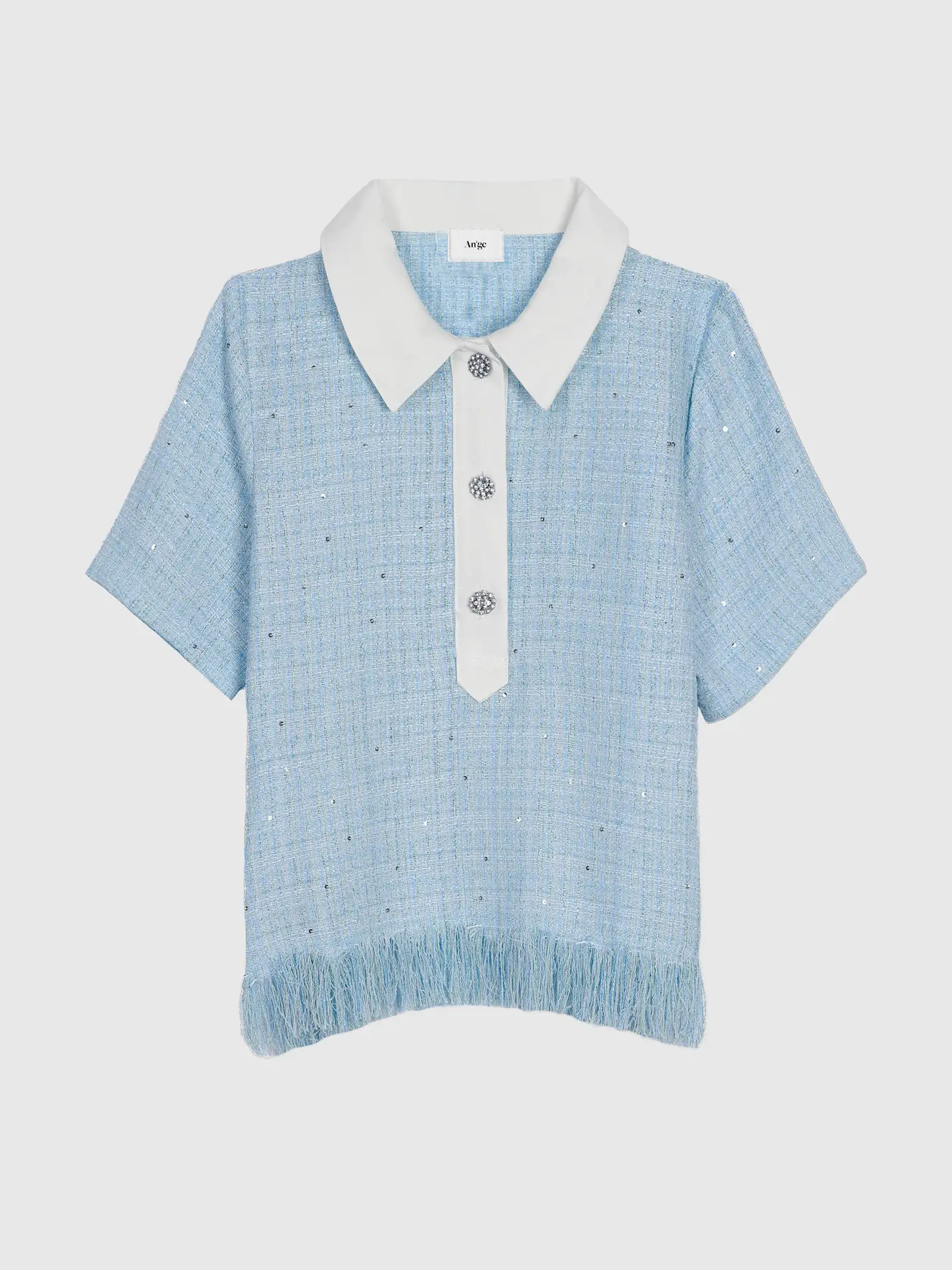 Le polo ciel en tweed
