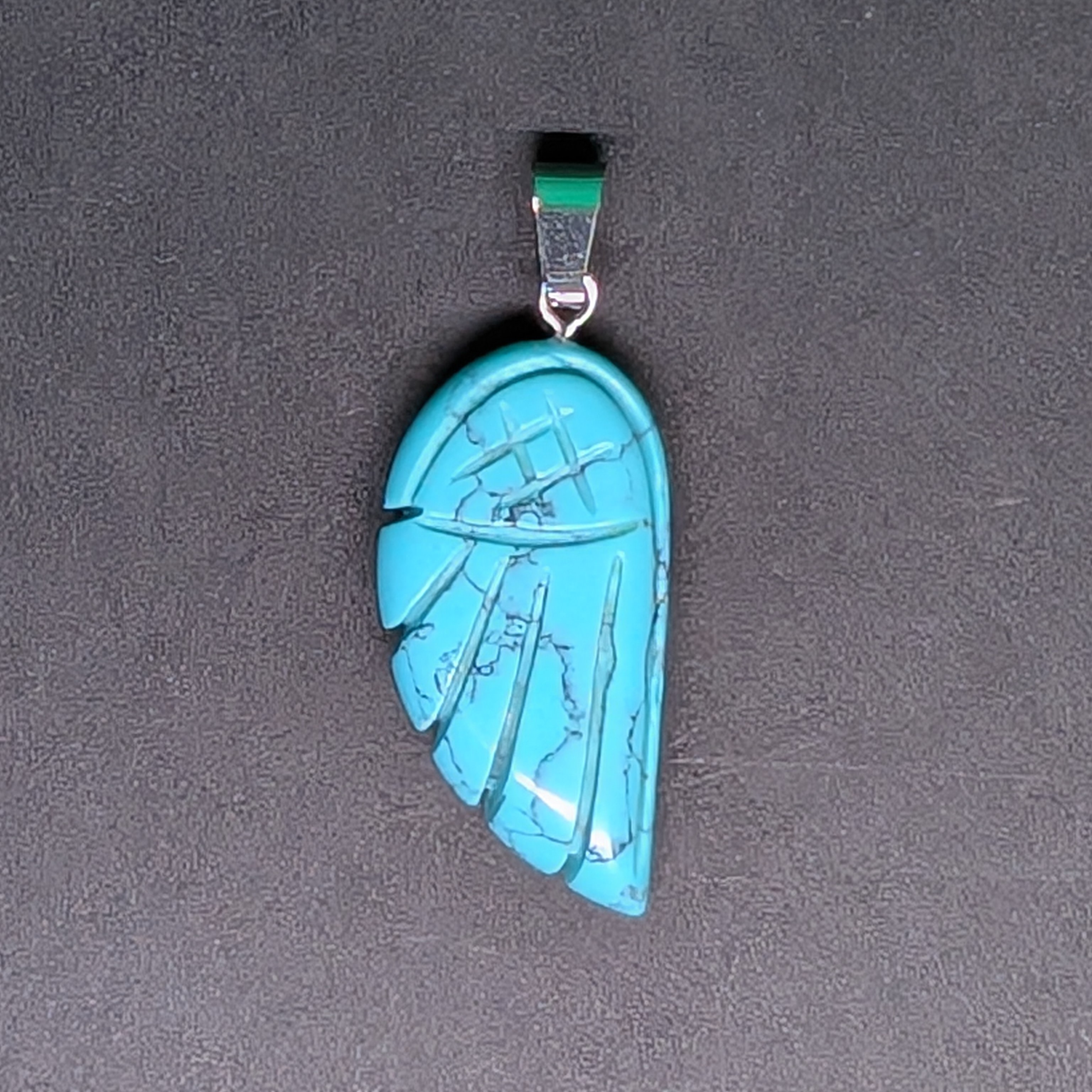 Hand-Carved Wing Pendant Stabilized Turquoise