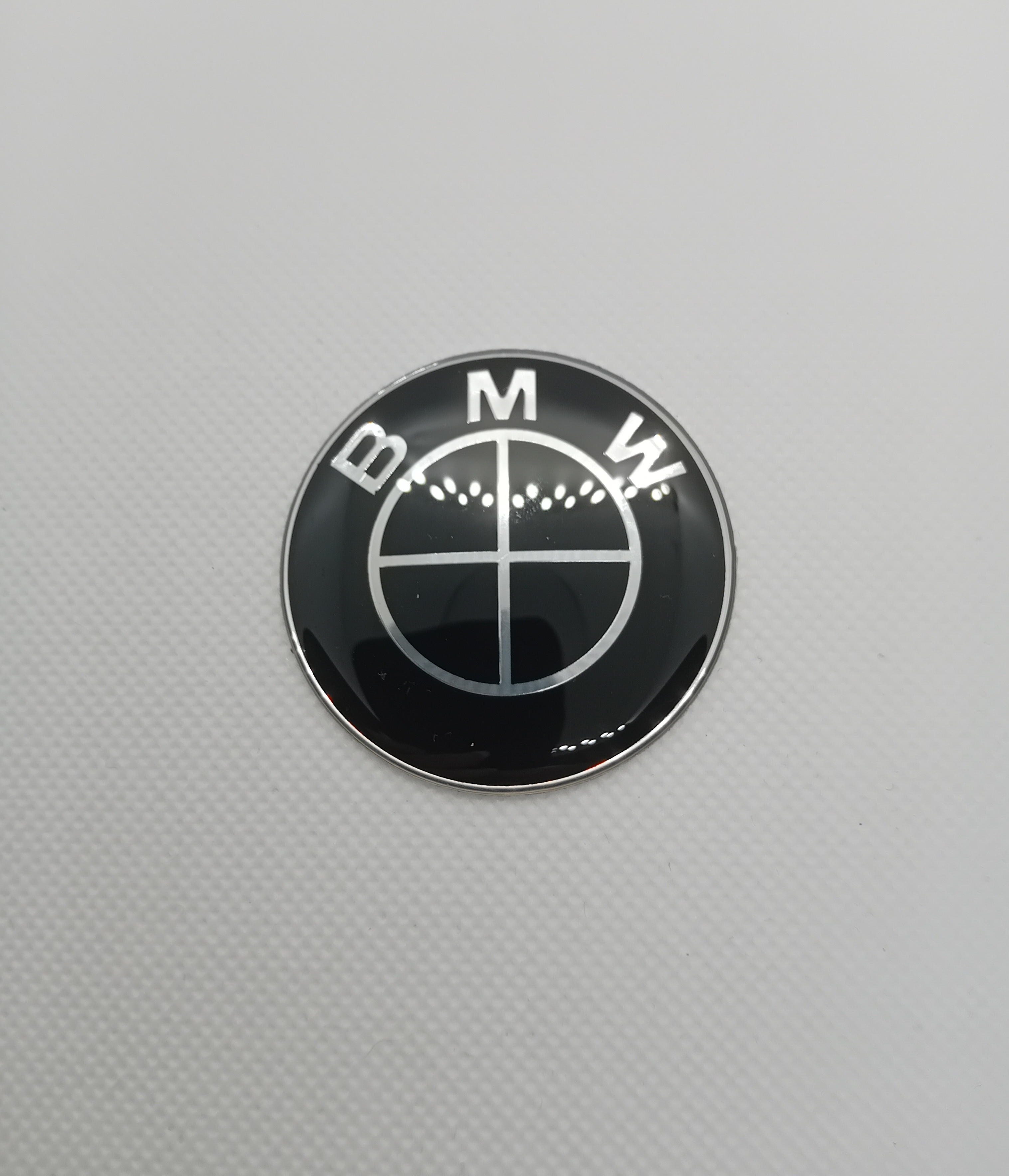 BMW vairo emblema (Juoda/juoda)