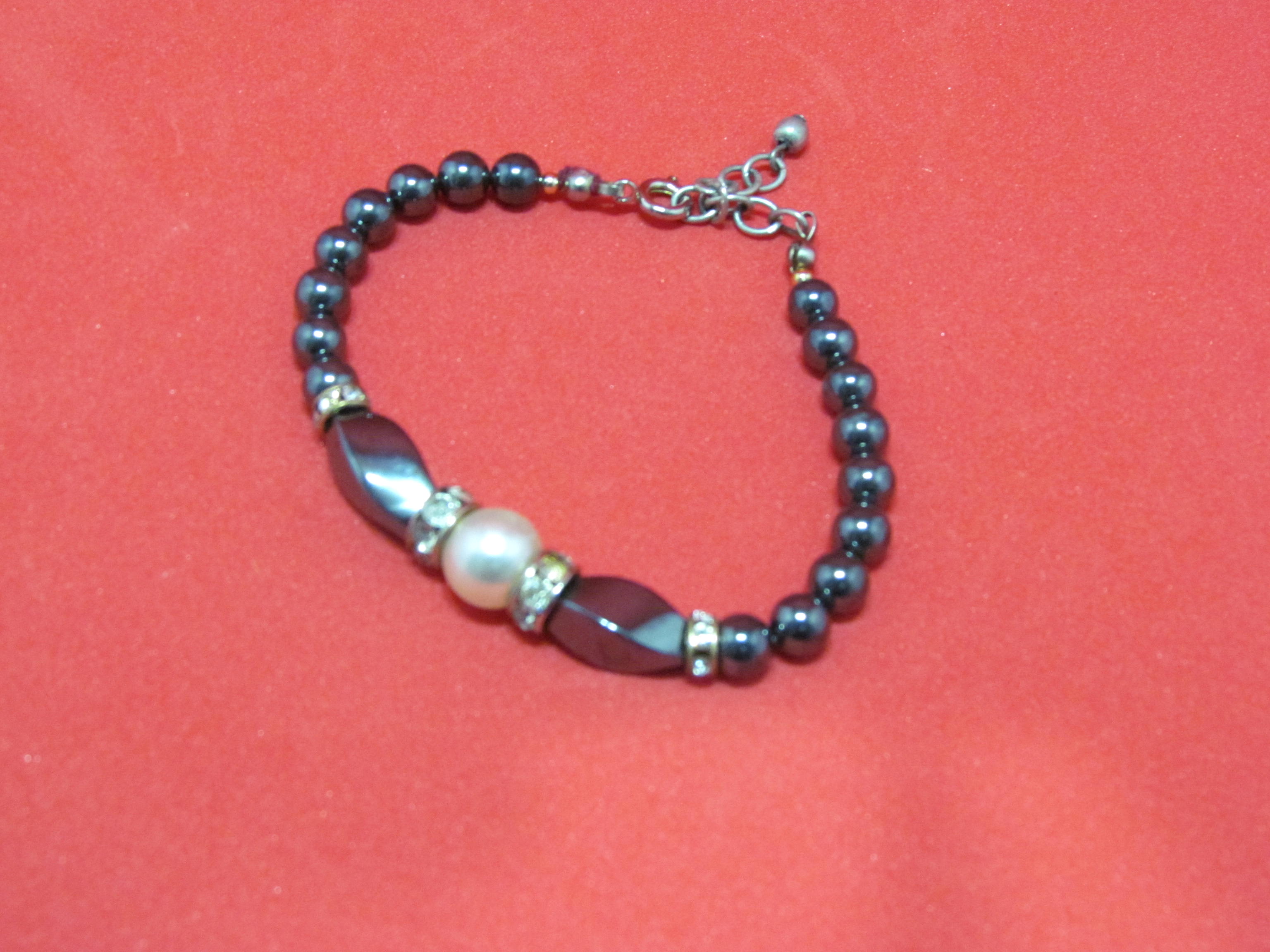 True Shining Hematite and Pearl Bracelet with Free Earrings.