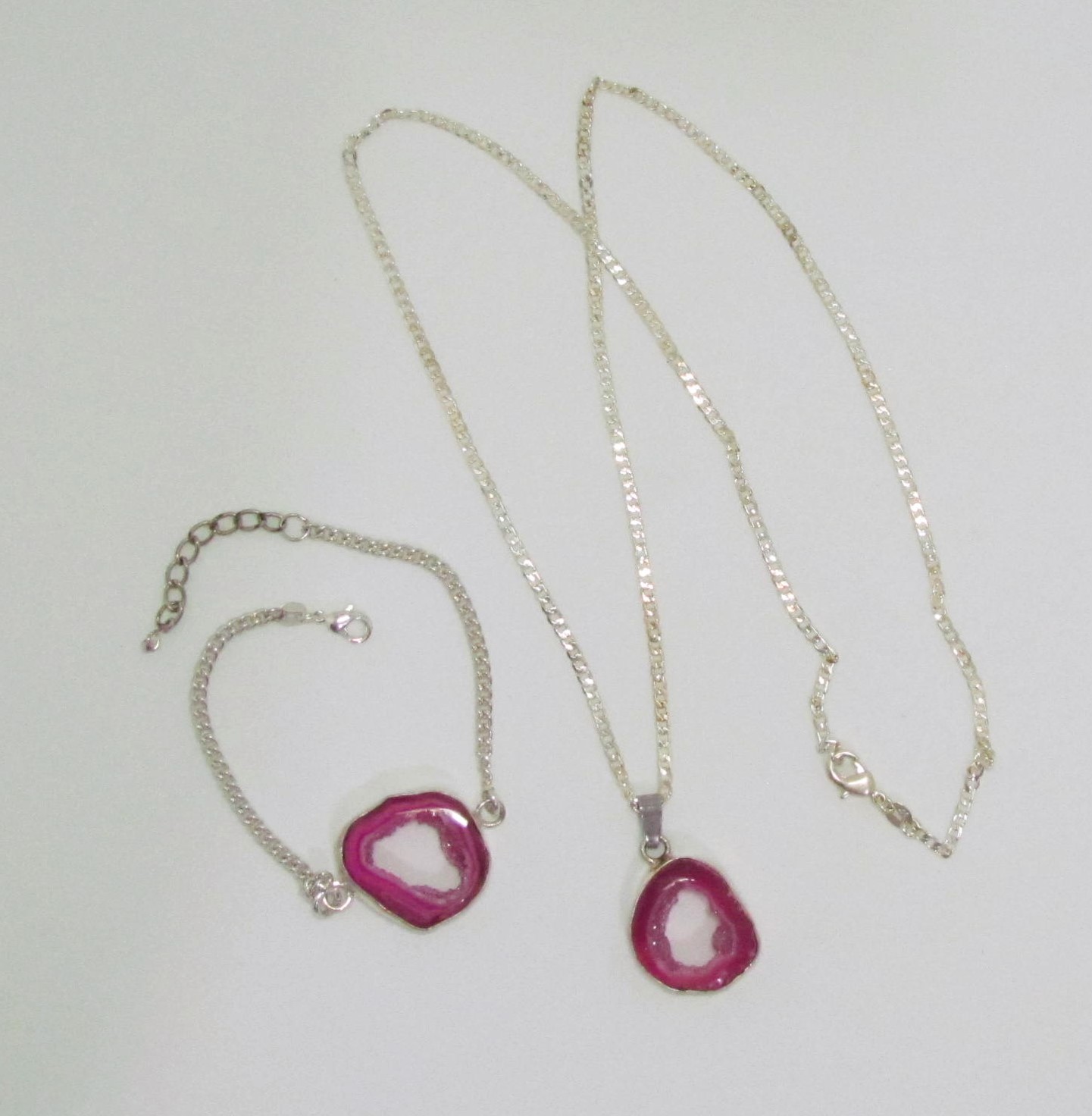 Natural Pink Geode Slice Hand Wrapped in Sterling Silver.