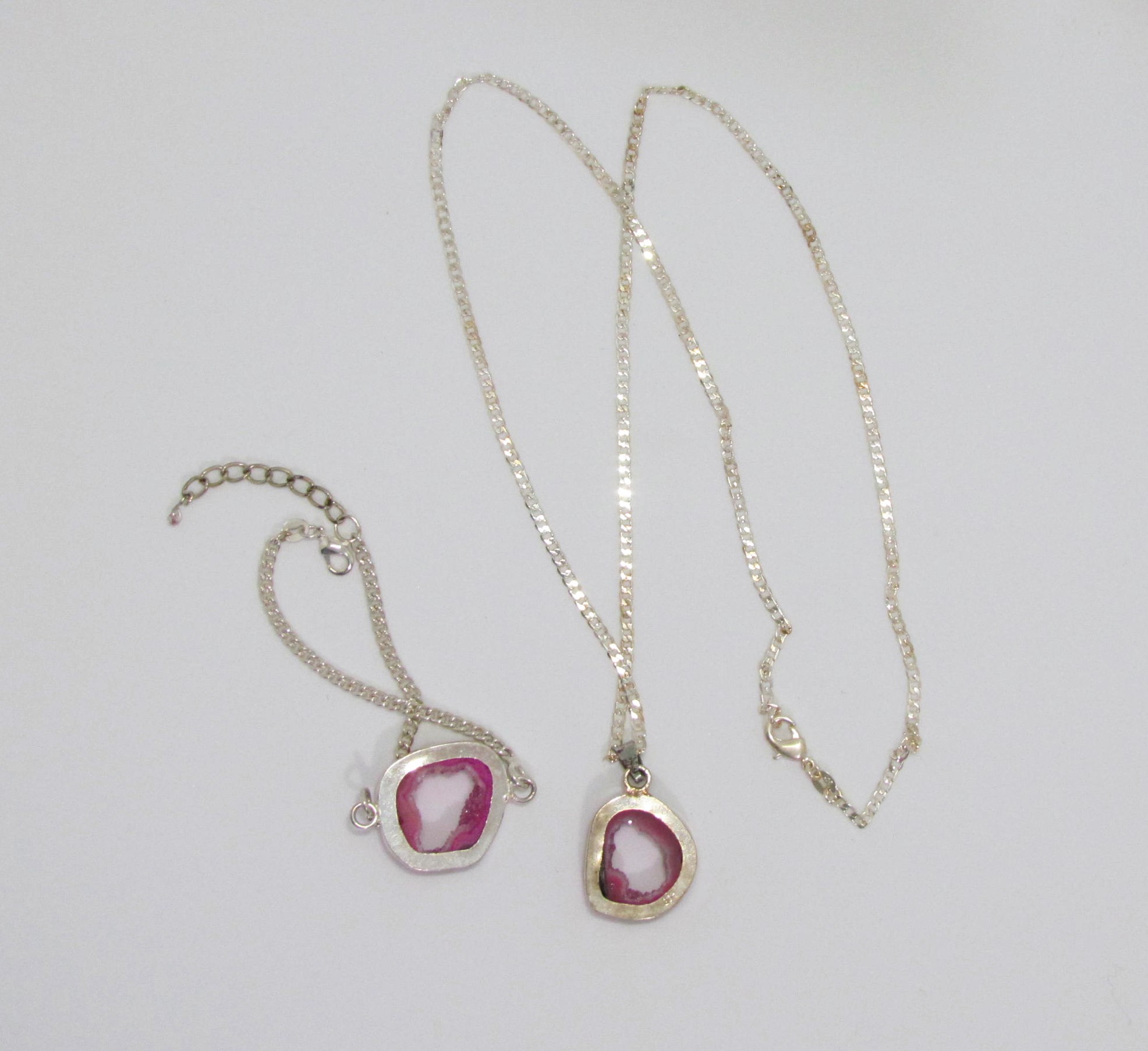 Natural Pink Geode Slice Hand Wrapped in Sterling Silver.