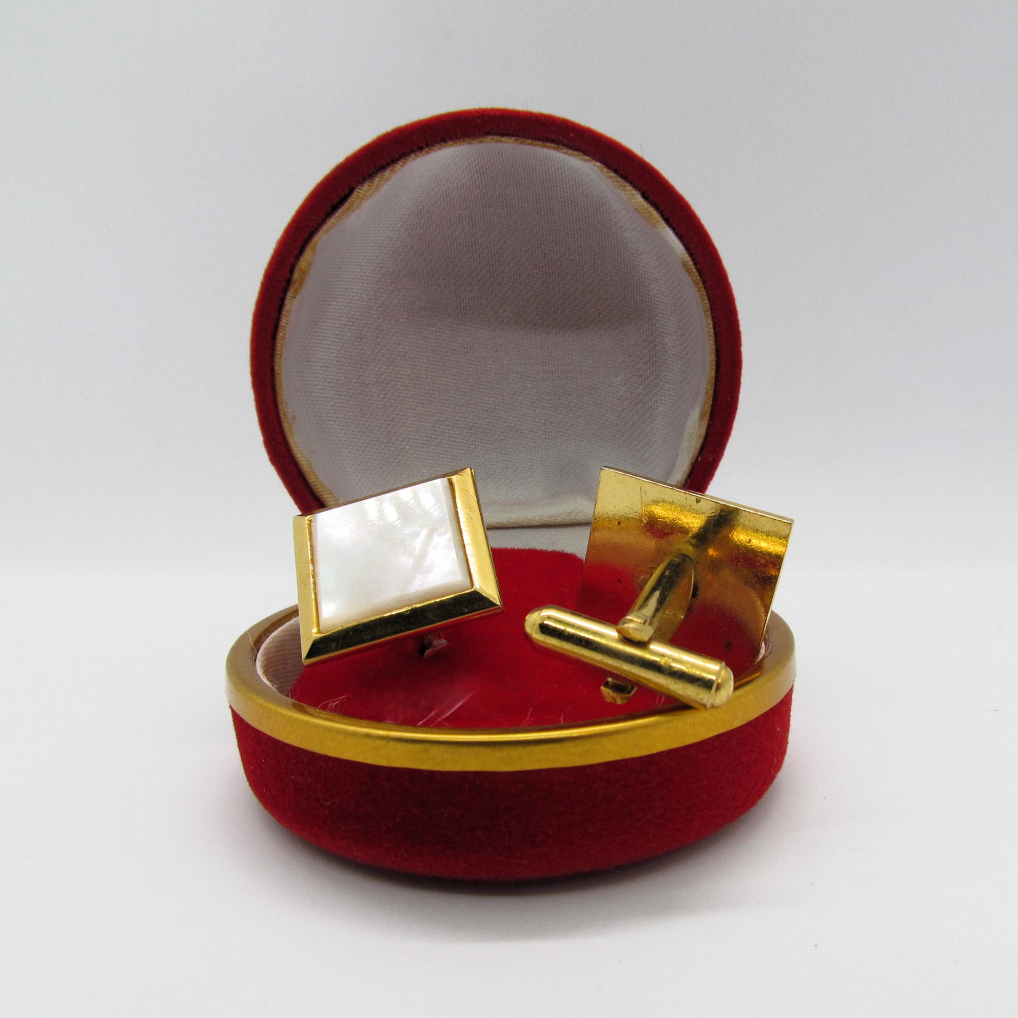 Strikng Mother of Pearl Gold Cufflinks.