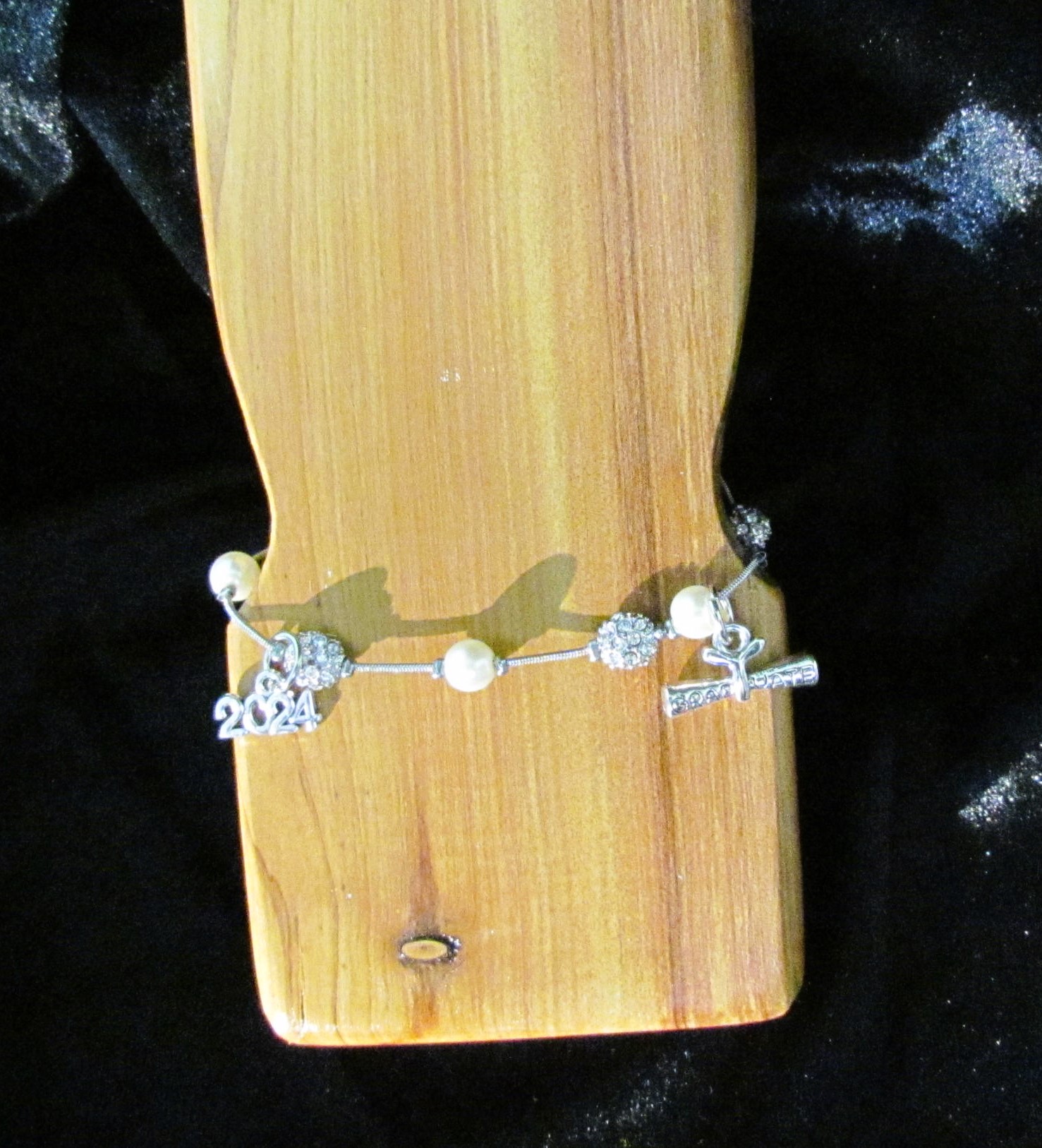 Shimmering 2024 Graduation Bracelet in Silver.