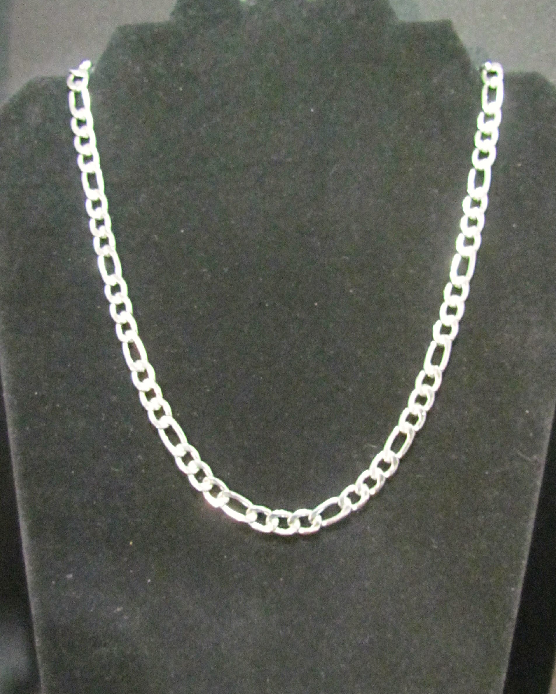 The Versatile Figaro Chain in anti tarnish Stainless Steel. 
