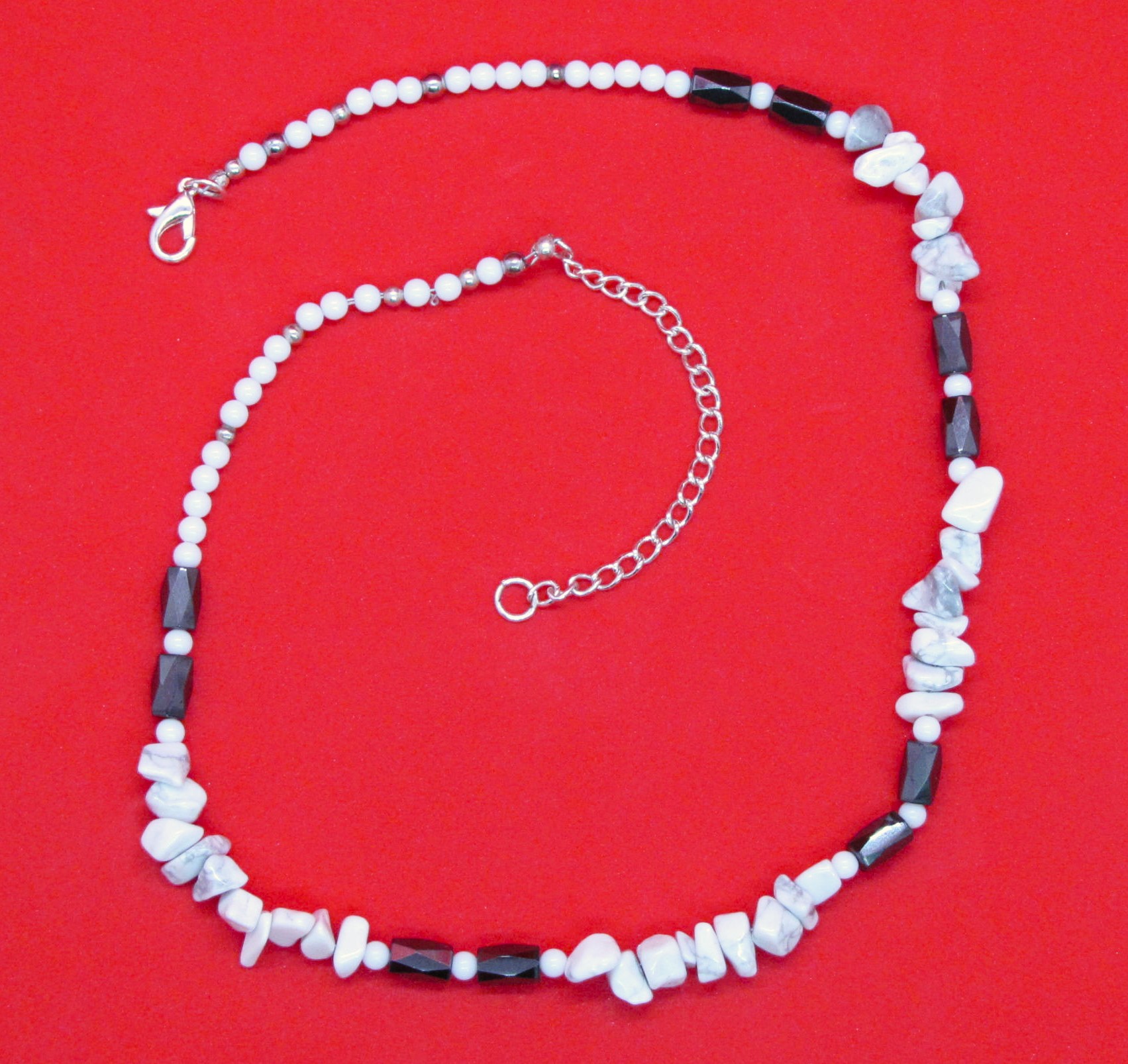 Handcrafted Story in Hematite and Howlite.