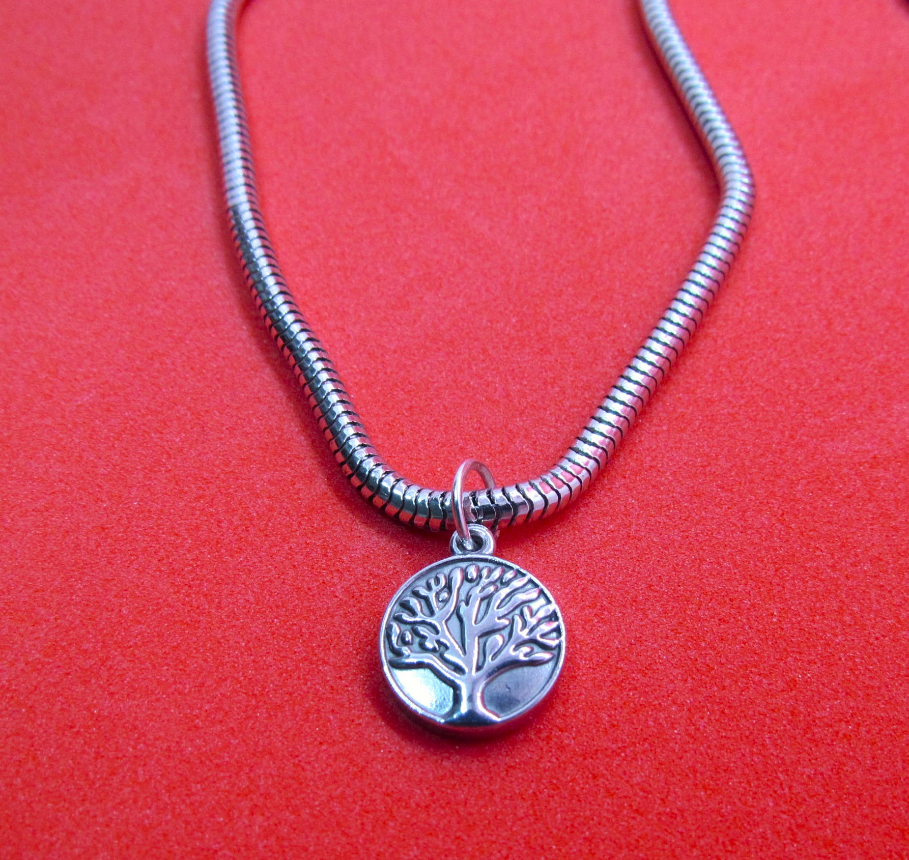 Roots of Strength: Tree of Life Stainless Steel Pendant.