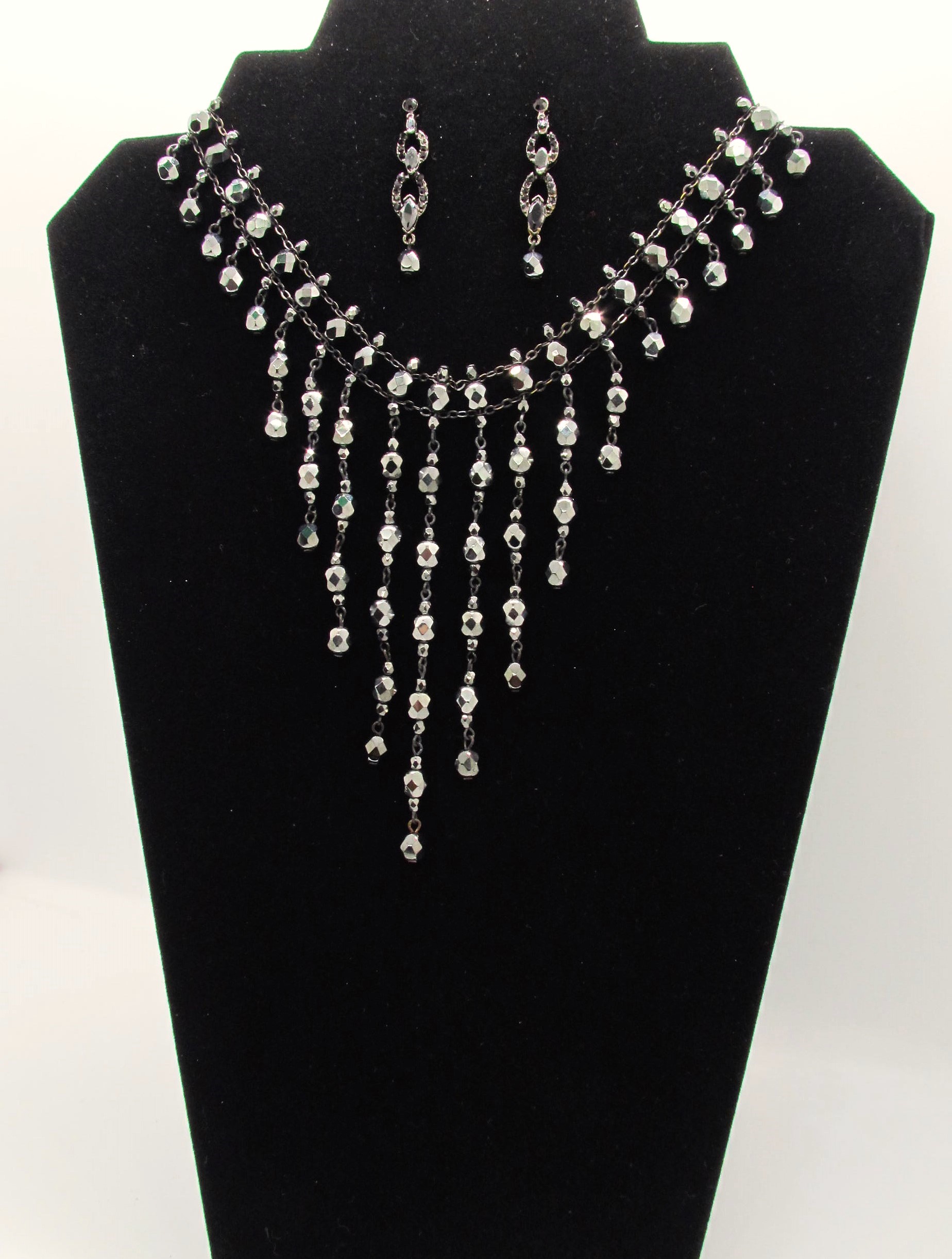 Glimmering Bevelled Gun Metal Grey Beaded Set.