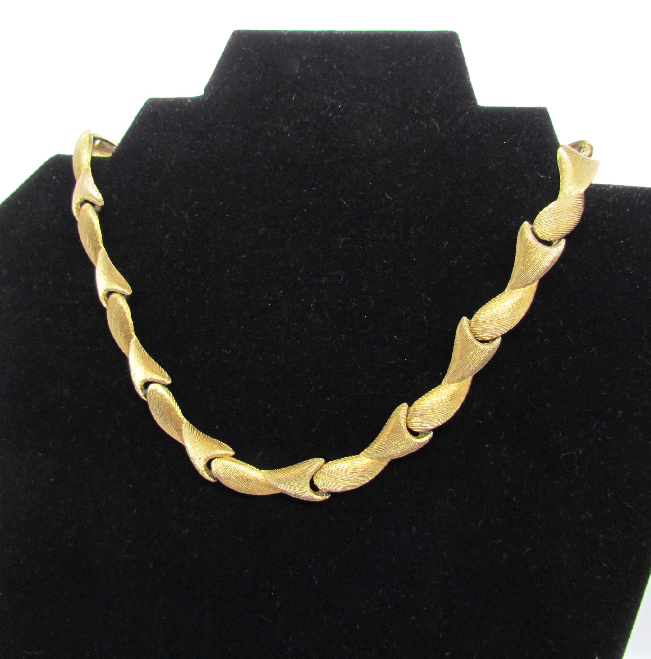 Monet Signed Gold Tone Sectional Choker Necklace.