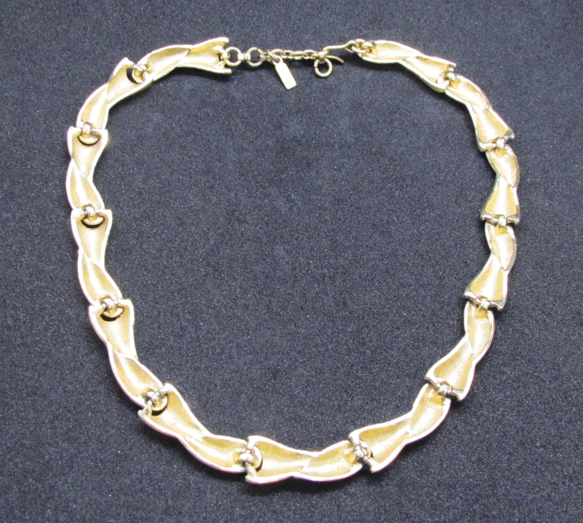 Monet Signed Gold Tone Sectional Choker Necklace.