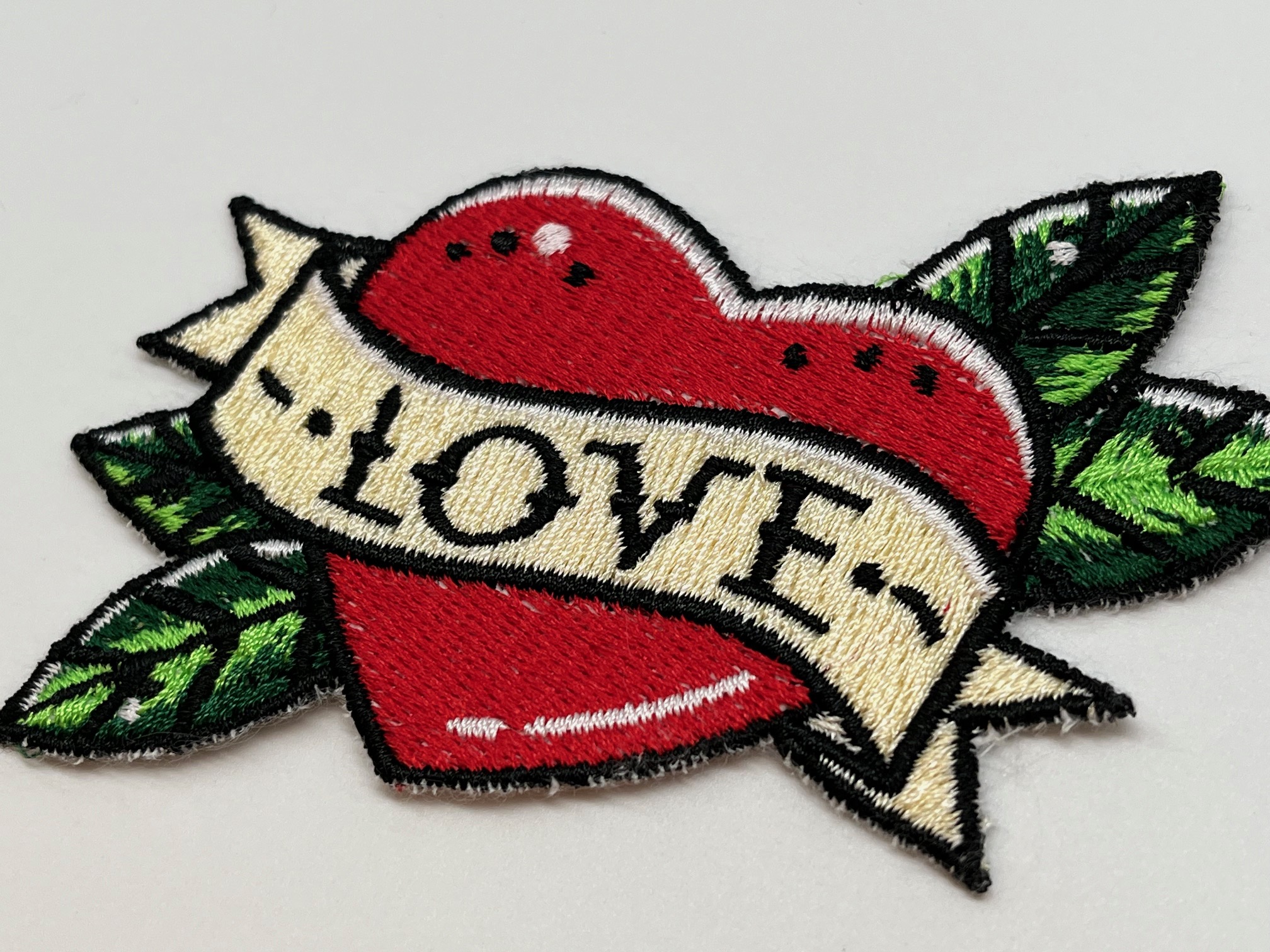 Applicatie om zelf te naaien op kleding of een tas