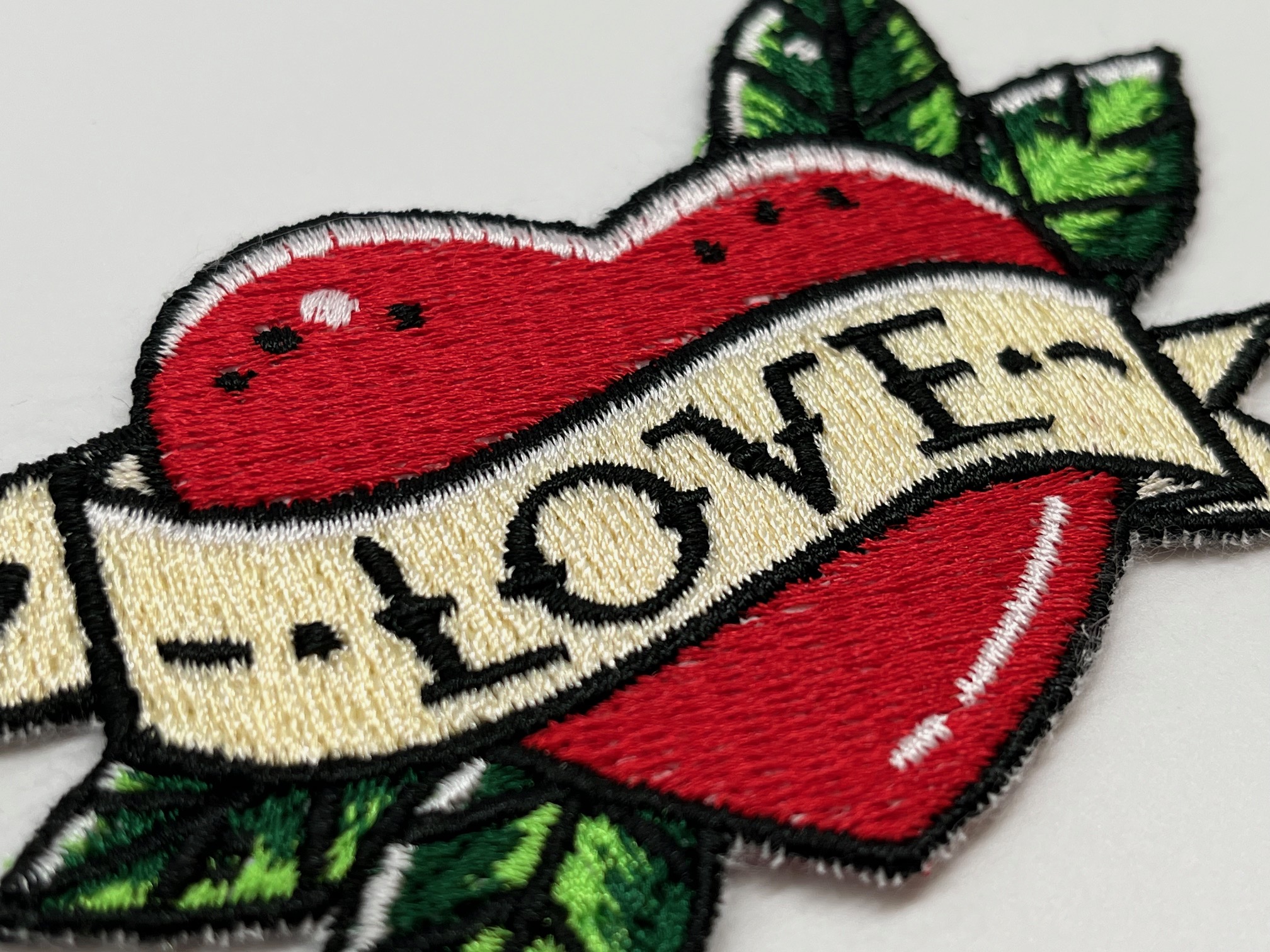 Applicatie om zelf te naaien op kleding of een tas