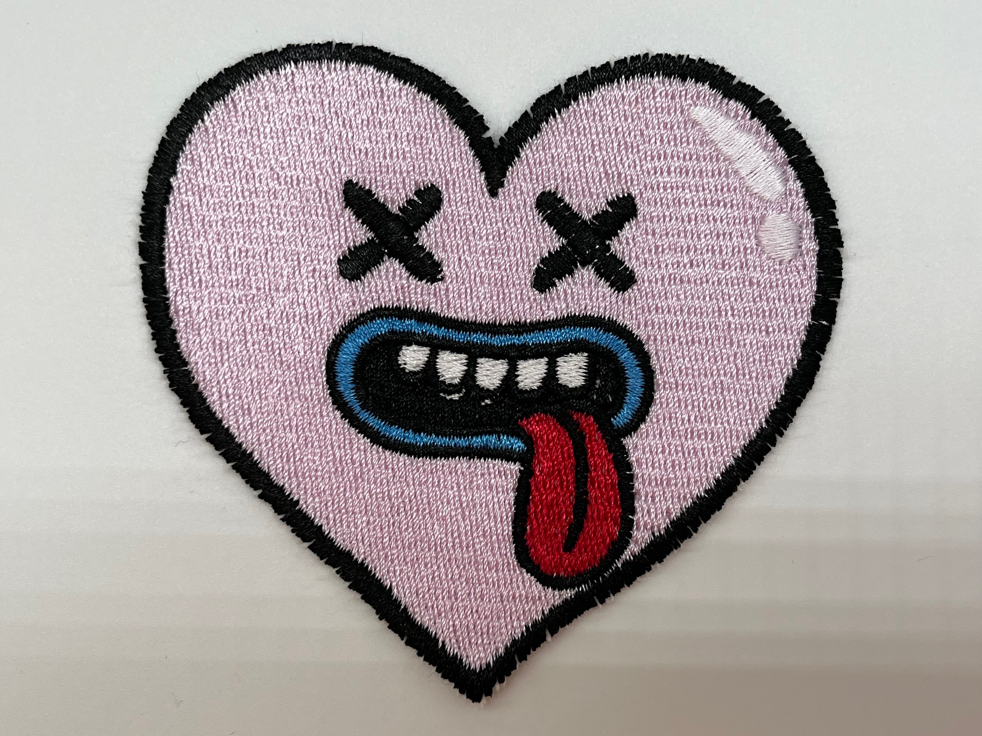 Applicatie om zelf te naaien op kleding of een tas