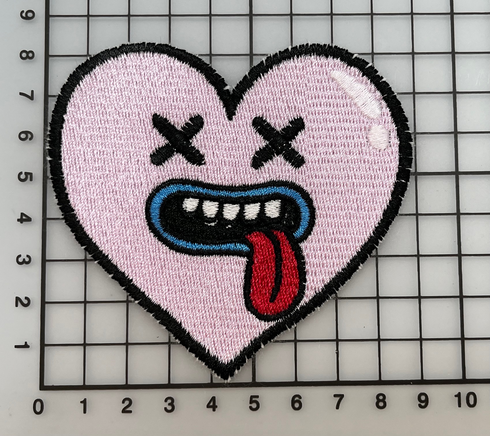 Applicatie om zelf te naaien op kleding of een tas