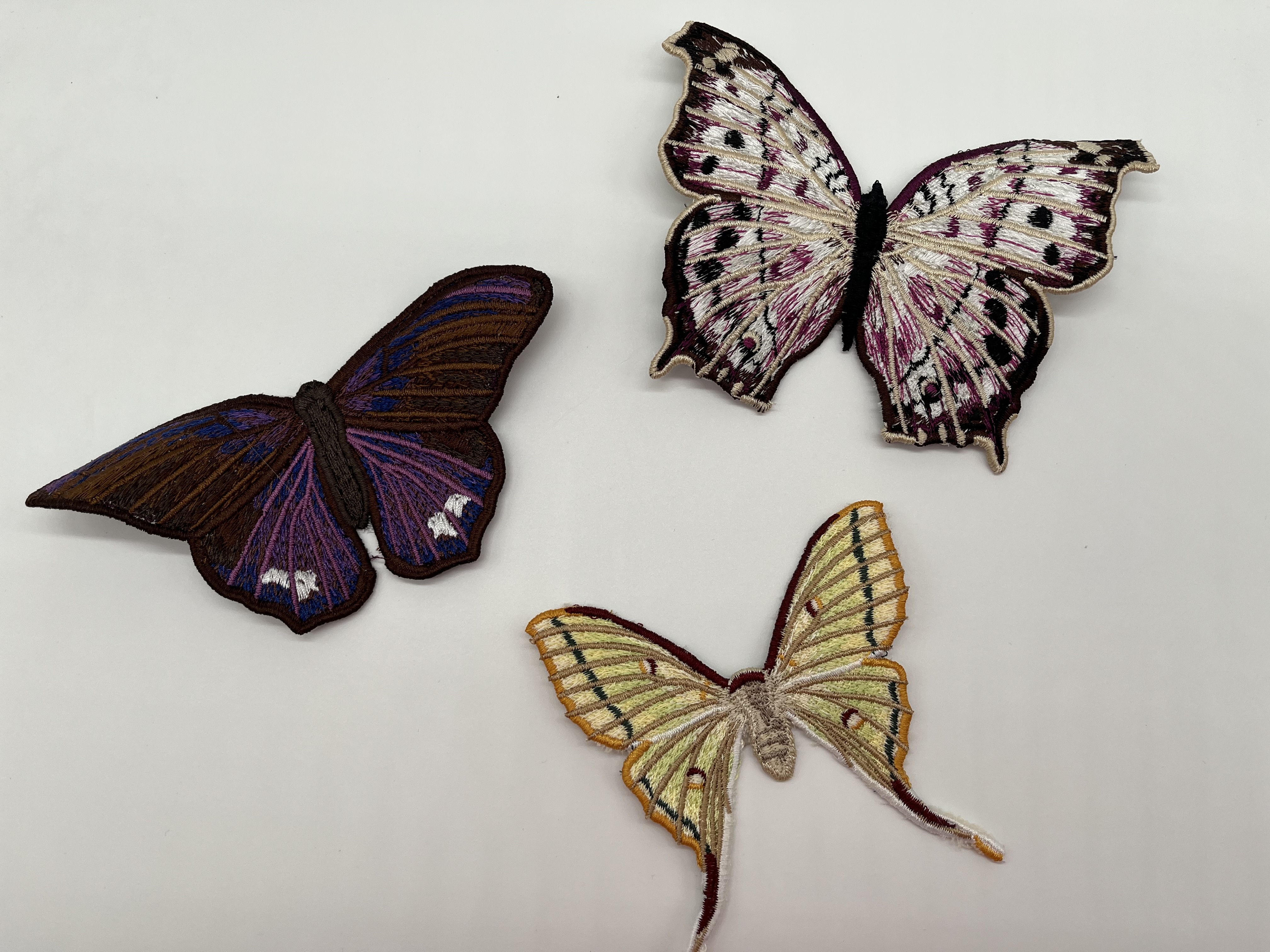 Geborduurde vlinders