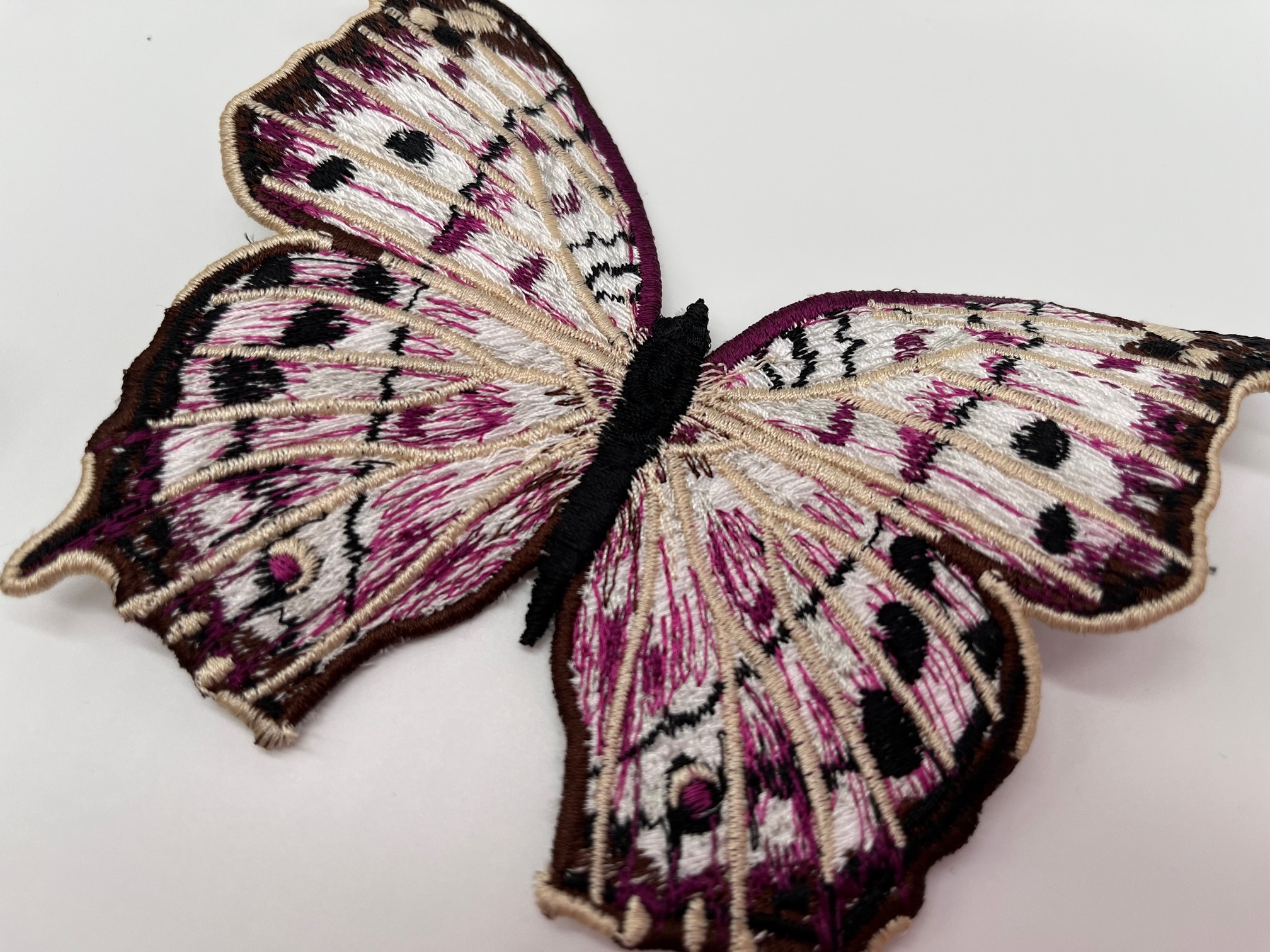 Geborduurde vlinders