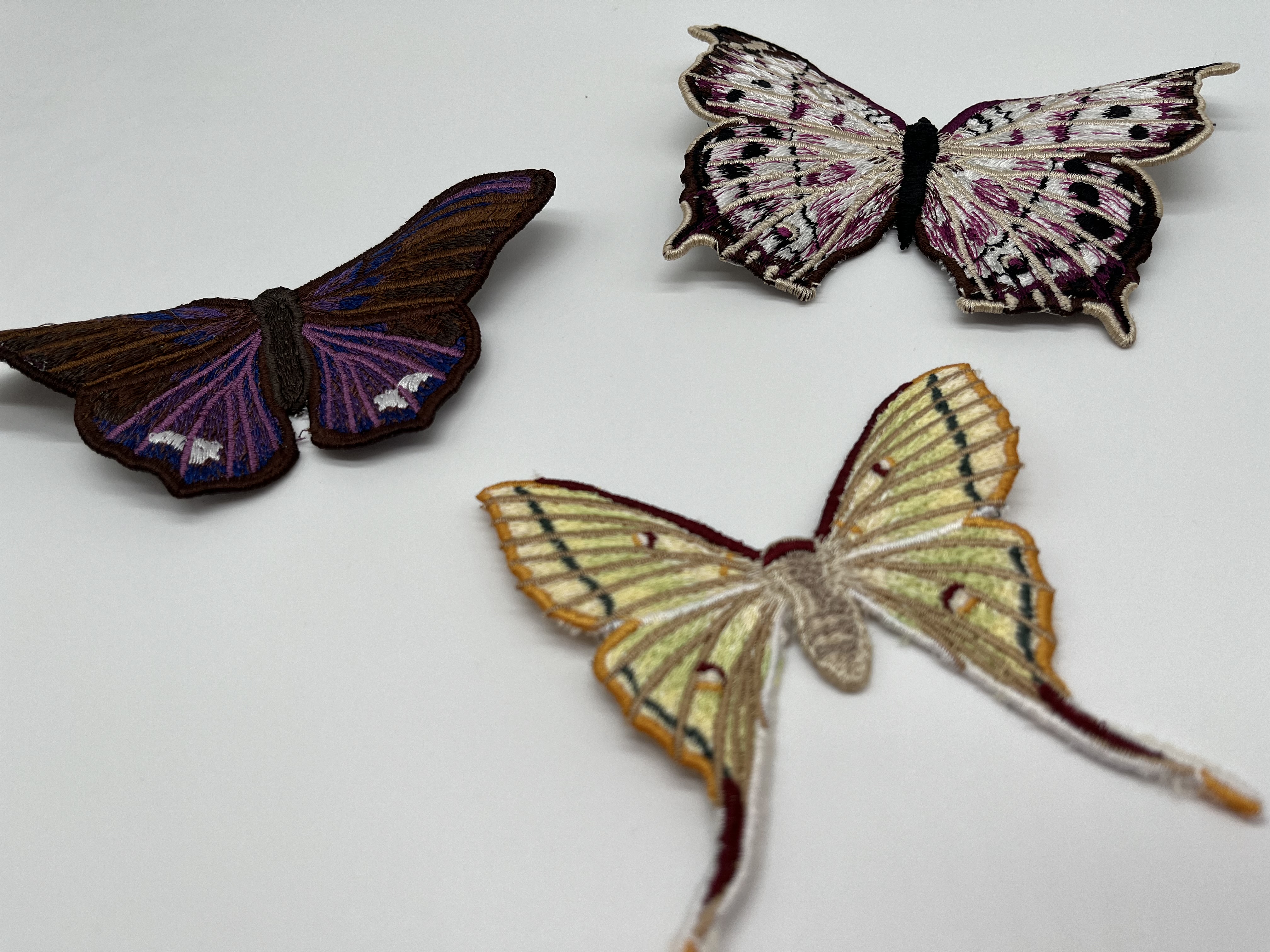 Geborduurde vlinders