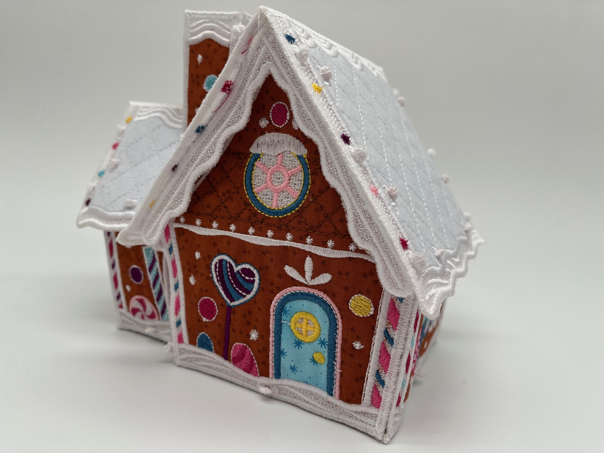 Geborduurd kerst huisje