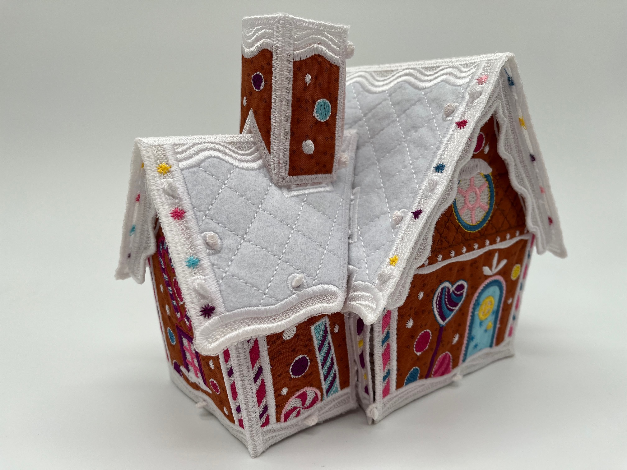 Geborduurd kerst huisje