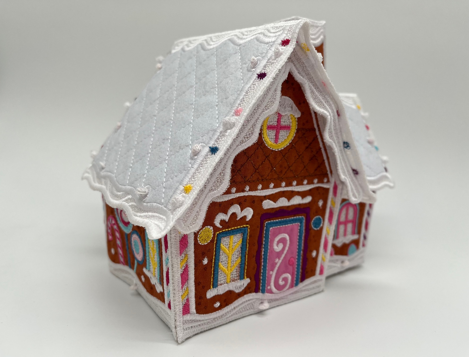 Geborduurd kerst huisje