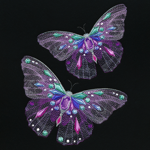 Kussenhoes met geborduurde delicate vlinders