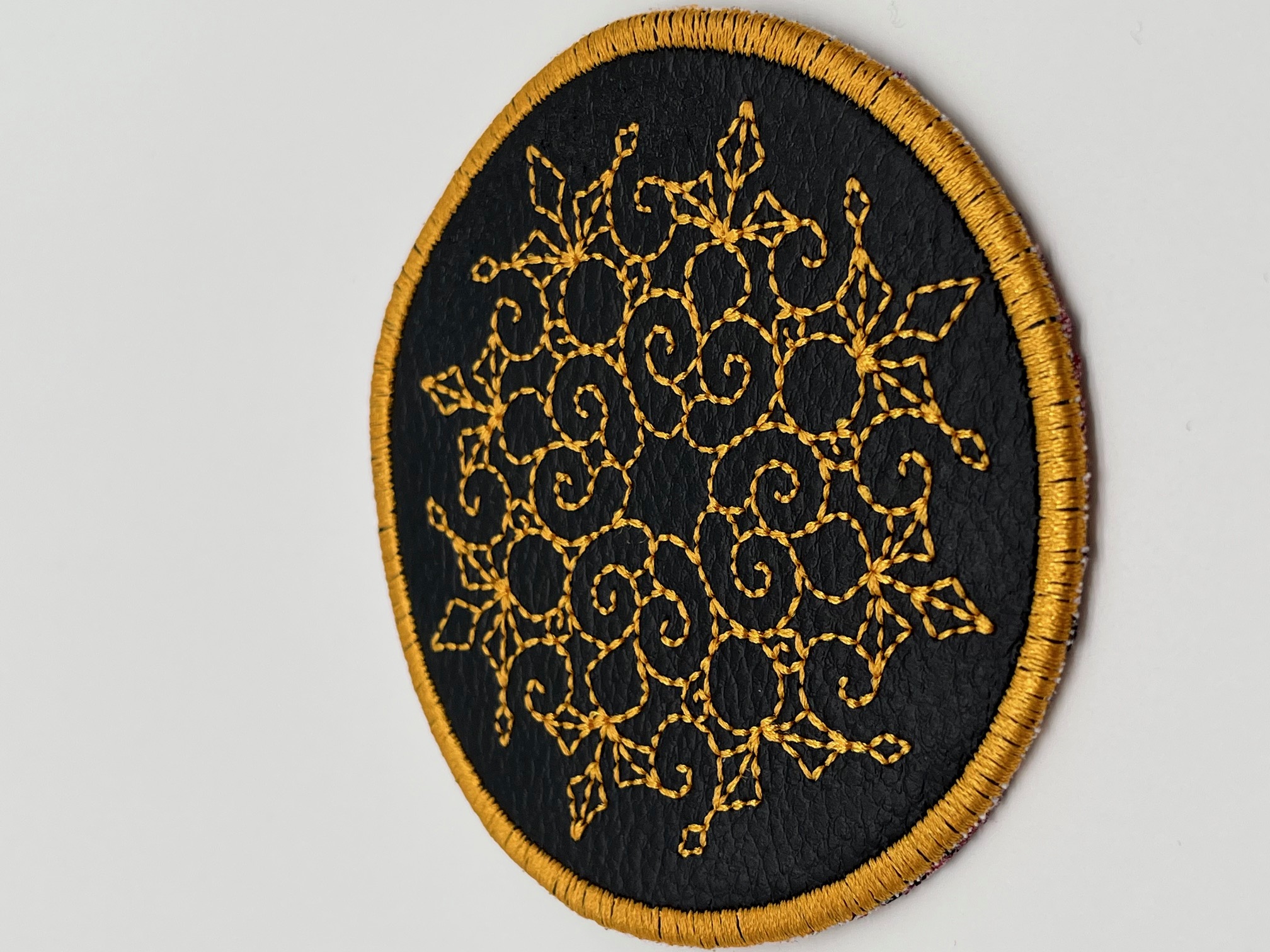 Geborduurde Onderzetter Goud