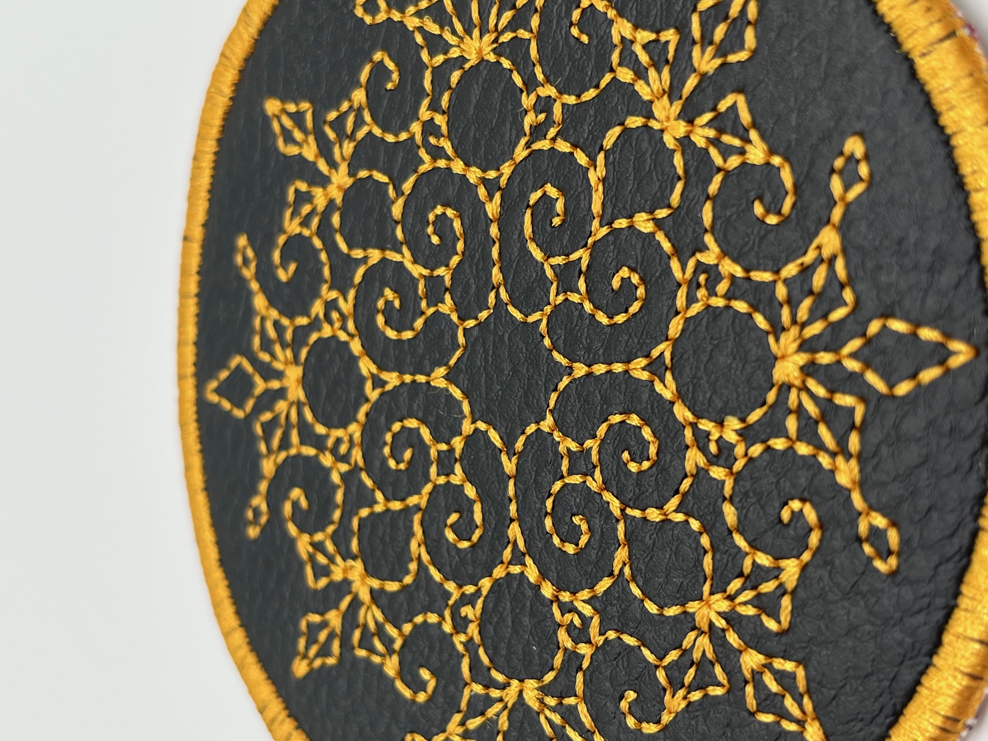 Geborduurde Onderzetter Goud