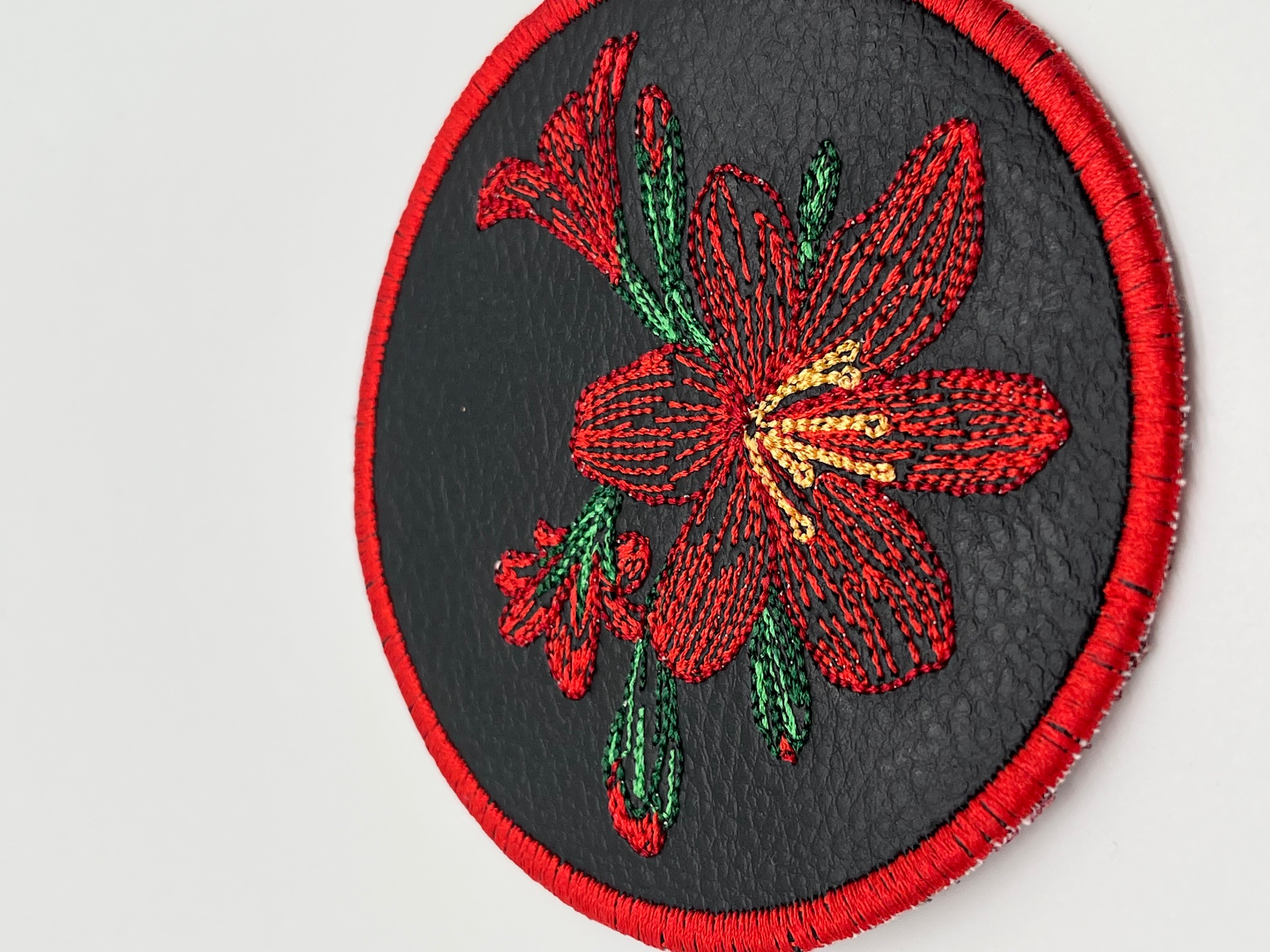 Geborduurde Onderzetter Bloem Rood, set van 4