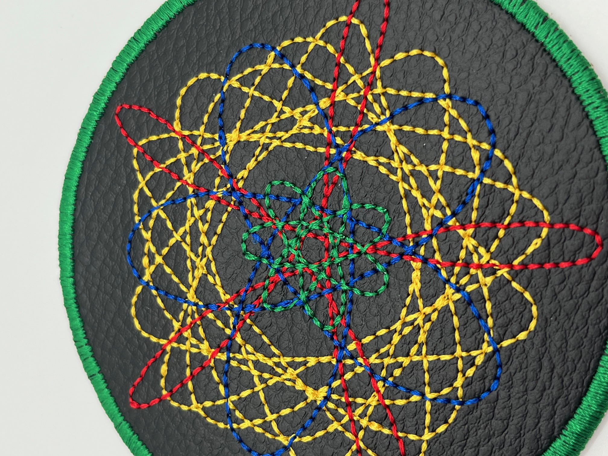 Geborduurde Onderzetter Spirograaf Groene rand, set van 4