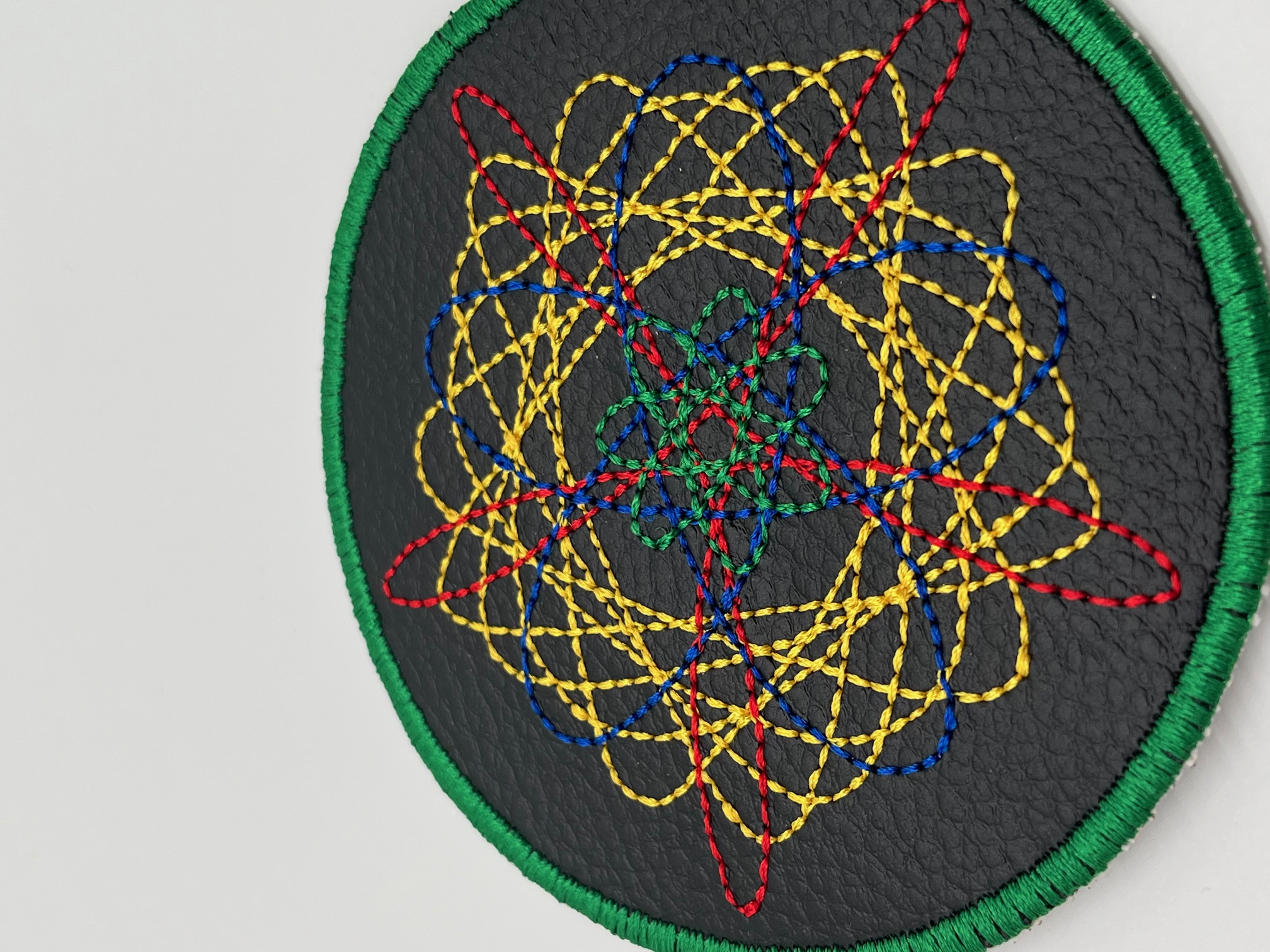 Geborduurde Onderzetter Spirograaf Groene rand, set van 4