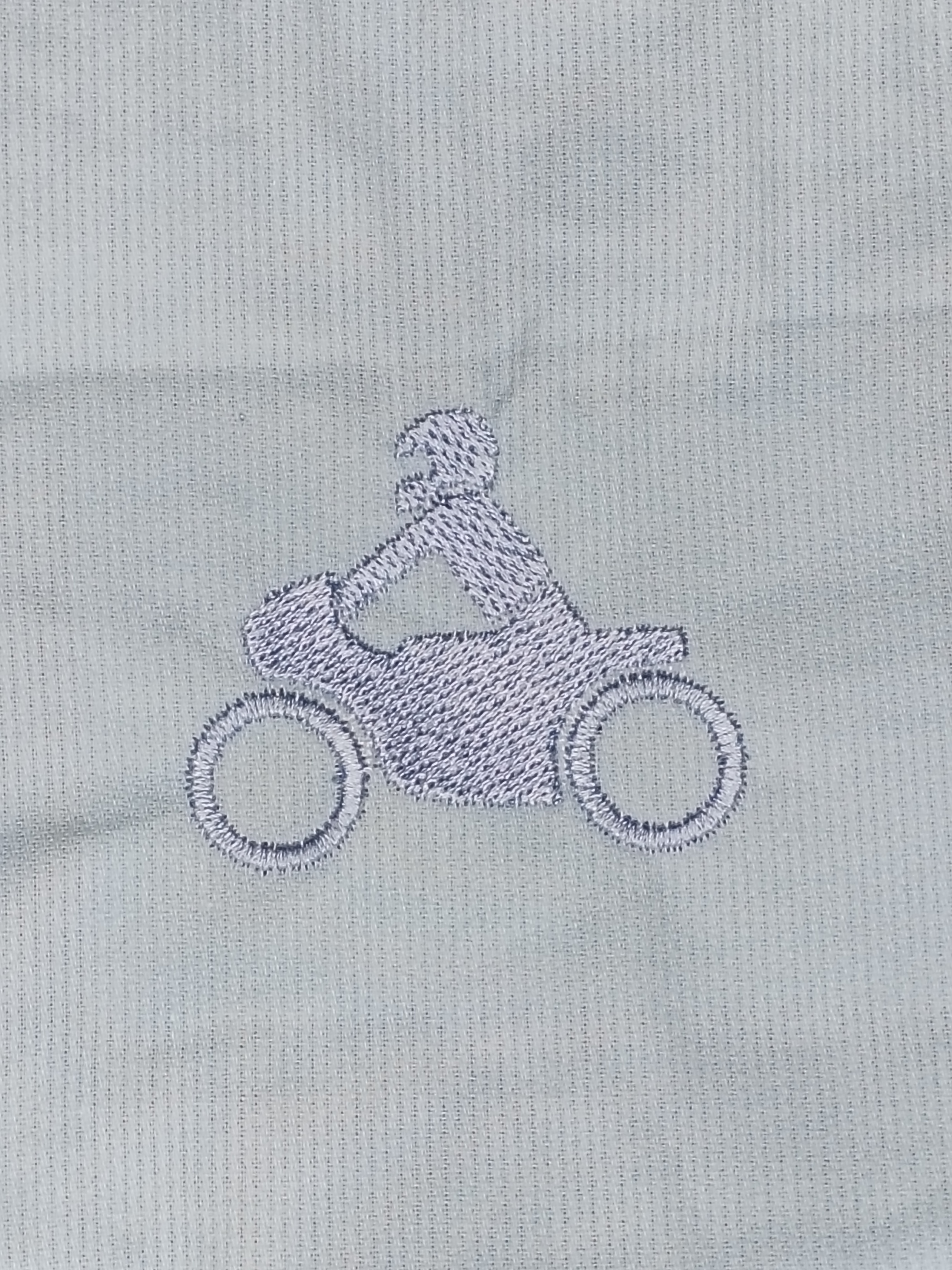 Bavoir moto bleu clair
