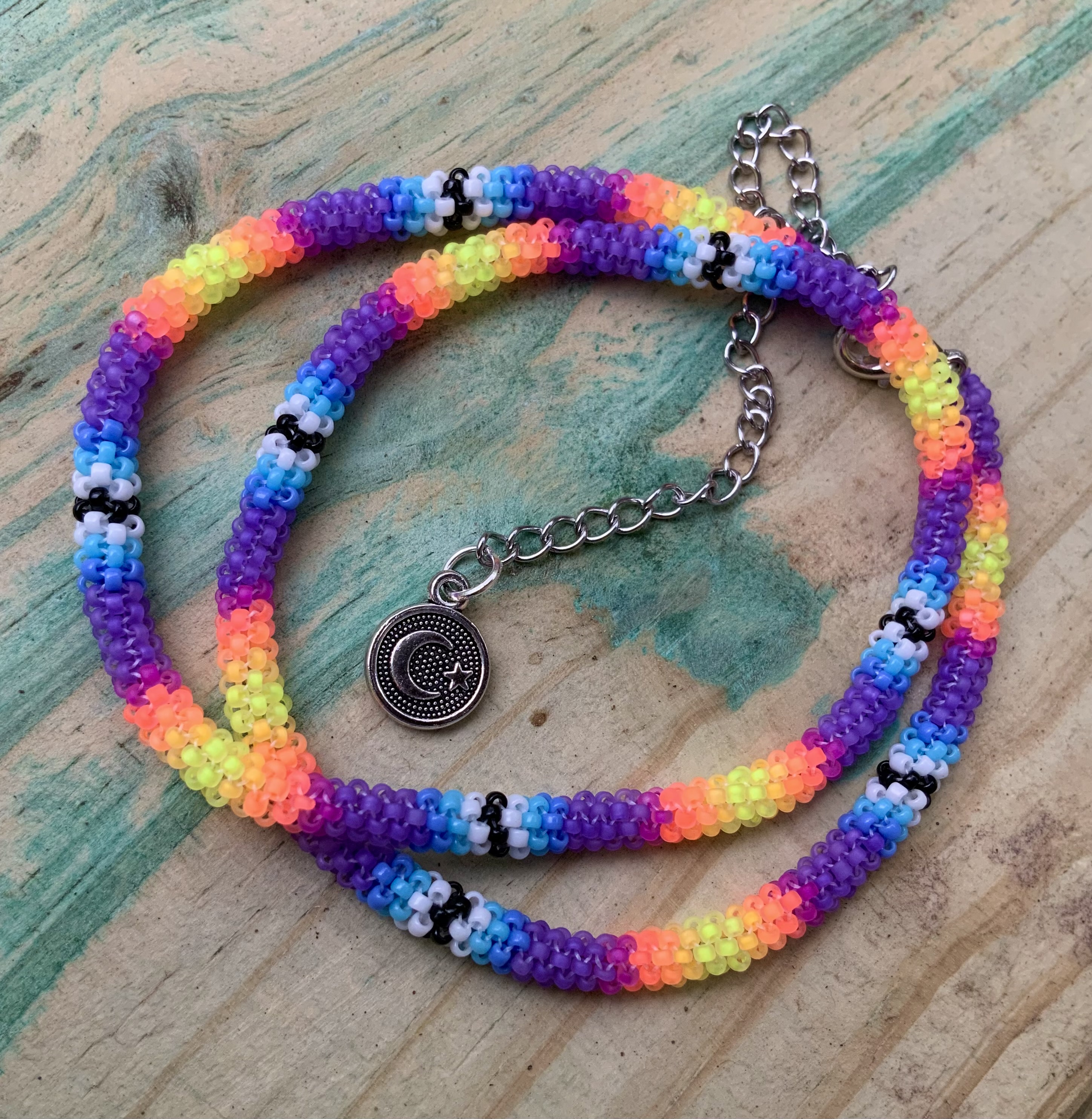 Purple glow monster beaded uv reactive necklace