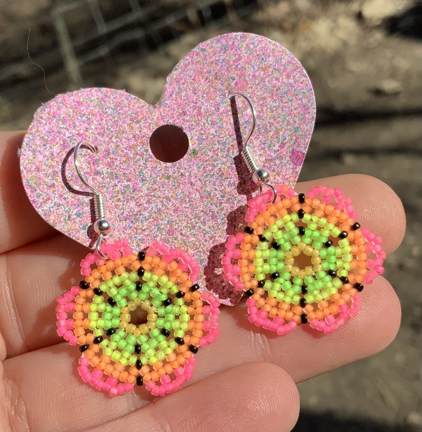 Blacklight reactive beaded flower earrings