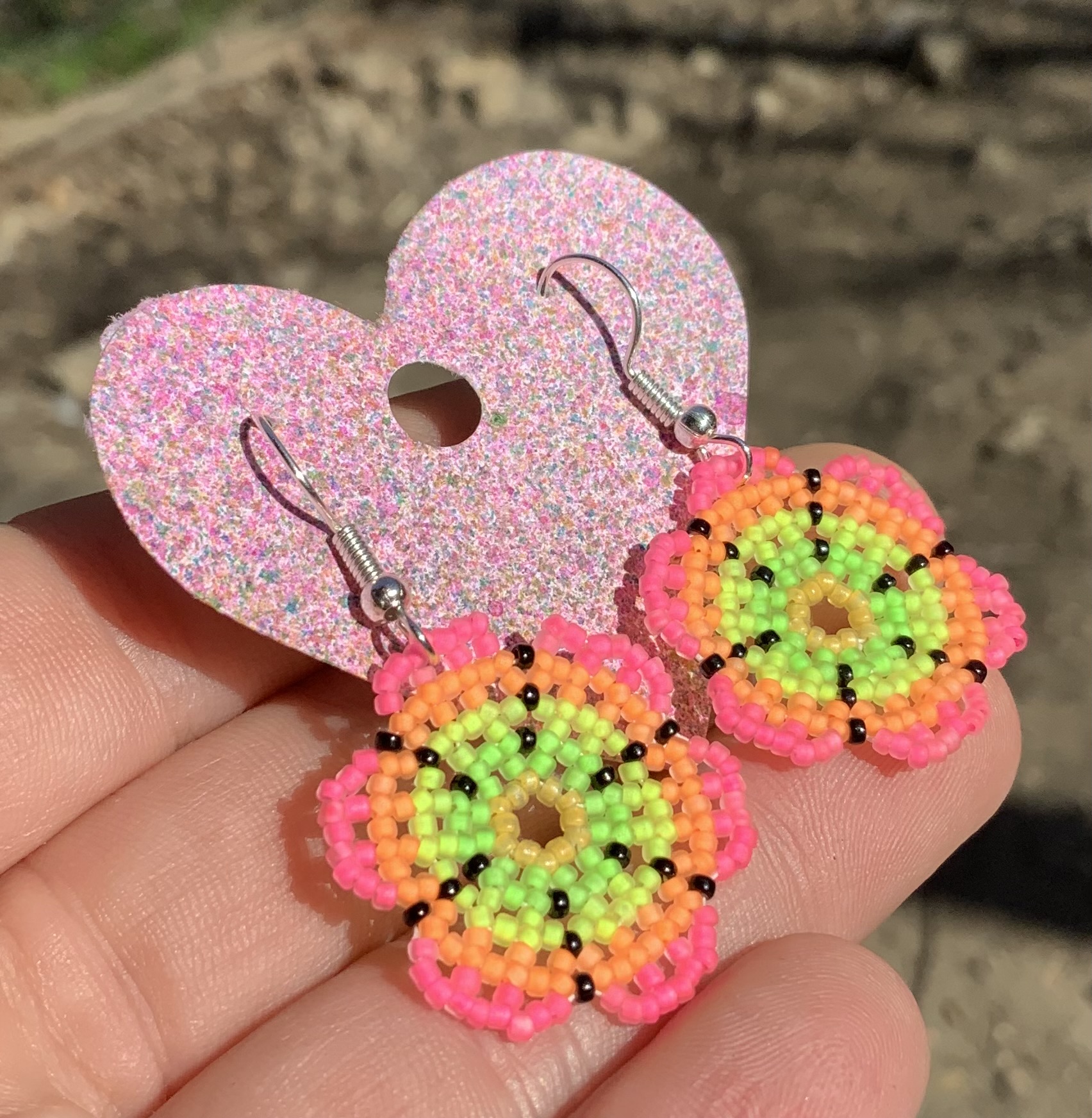 Blacklight reactive beaded flower earrings