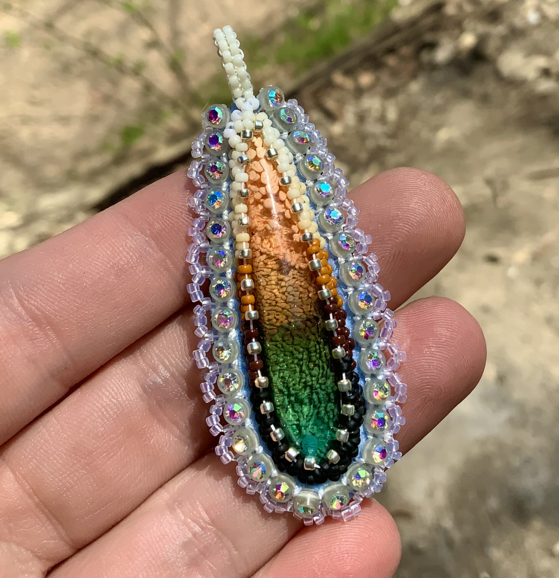 Earthy tear drop beaded pendant