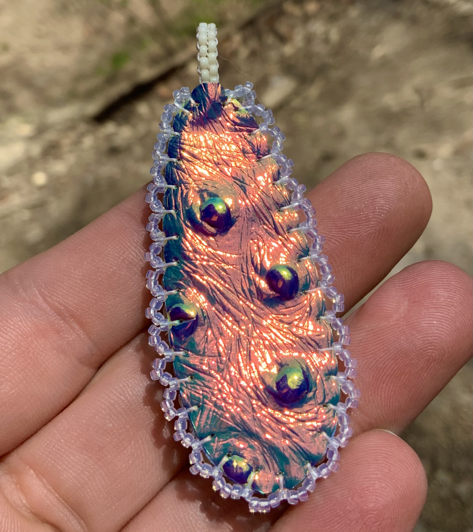 Earthy tear drop beaded pendant