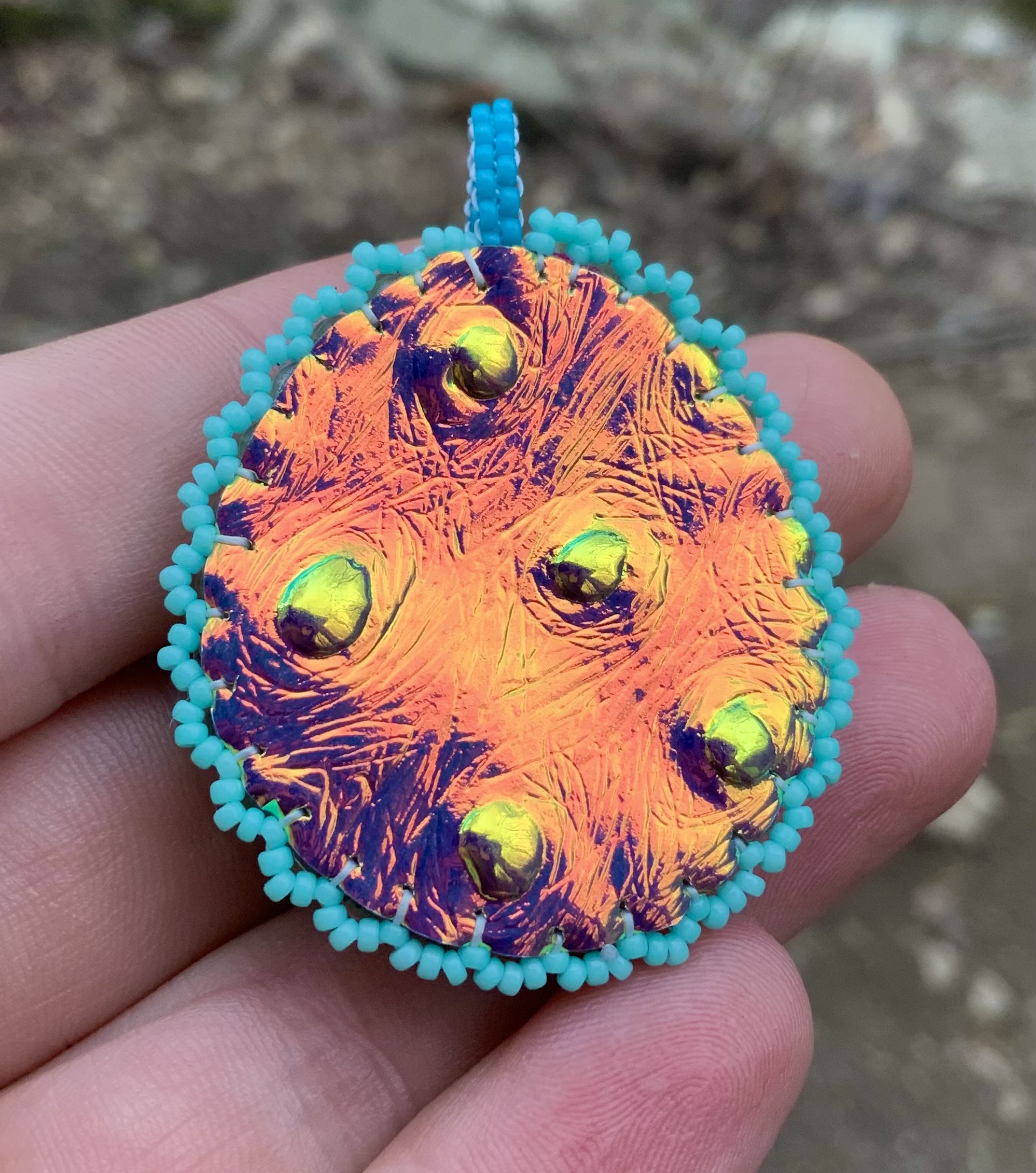 Tinkle teal beaded pendant
