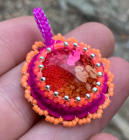 Fire flow beaded pendant