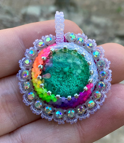 Icey rainbow beaded pendant