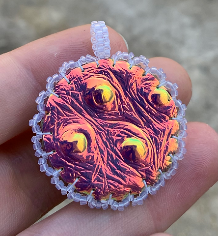Icey rainbow beaded pendant