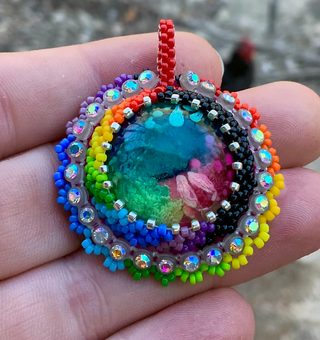 Bright side of the moon beaded pendant