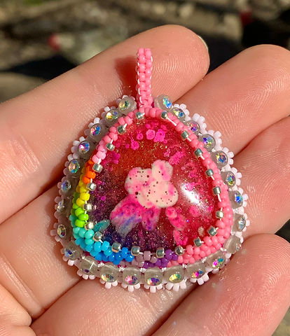 Rainbow daisy beaded pendant