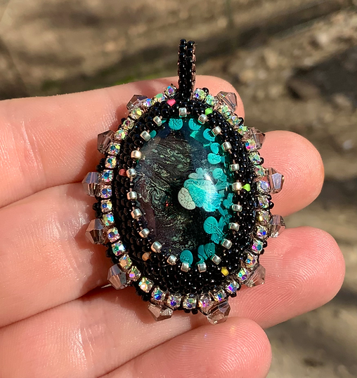 Ash lava beaded pendant